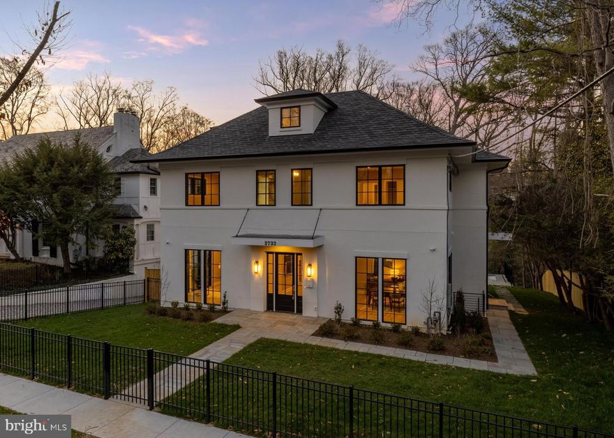 Ideally situated in the heart of Forest Hills on a quiet cul de sac, just moments from neighborhood favorites along Connecticut Avenue, the Van Ness Metro, and the scenic trails of Rock Creek Park, 2733 Chesapeake Street NW is a newly constructed residence that seamlessly blends timeless architecture with modern luxury. Designed for both comfortable living and elevated entertaining, the home offers refined finishes, generous proportions, and effortless indoor-outdoor flow across four beautifully finished levels. An elevator services the main three levels.<br>

Outdoor living is integral to the home’s design, featuring a private terrace, screened porch, flat front and rear yards, and scenic vistas, all anchored by a stunning 10 by 20 soaking pool, creating a serene, resort-like setting for al fresco dining and relaxed evenings under the stars.<br>

Inside, wide-plank hardwood floors, designer lighting, and curated materials establish a warm, sophisticated tone. The main level features an open yet intentional layout, anchored by a chef’s kitchen with an oversized island, custom cabinetry, and professional-grade appliances, complemented by a well-appointed butler’s pantry.<br>

The adjoining family room centers around a fireplace and, along with the main level, opens to a spacious screened-in porch creating a seamless extension of the living space for indoor-outdoor entertaining.<br>

Upstairs, the primary suite offers a light-filled retreat with peaceful, tree-lined views, a spa-inspired bathroom and two large walk-in closets. Three additional bedrooms are generously sized, each with en-suite baths. The third floor boasts a private living room and a bedroom with an additional bathroom.<br>

The walk-out lower level provides flexible space for recreation and entertaining, highlighted by a dedicated room with soaring 11-foot ceilings, designed for a golf simulator or private home theater, along with space for a gym, lounge, and a bedroom suite for guest accommodations.<br>

Built with an emphasis on quality and craftsmanship, this home delivers a turnkey living experience in one of Washington’s most sought-after neighborhoods.