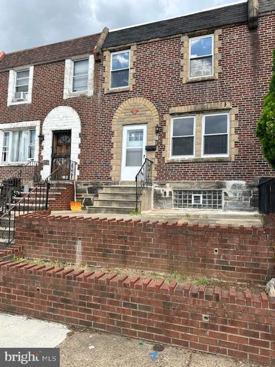 Nestled in the vibrant Juniata Park neighborhood, this impeccably refreshed 3-bedroom home blends modern upgrades with classic charm. Every room welcomes you with freshly painted walls and beautiful new flooring—inviting and move-in ready. The basement level features a stylish, renovated bathroom that elevates everyday convenience. Enjoy seamless convenience with interior access to the garage from the basement level—perfect for unpacking groceries or keeping vehicles secure.