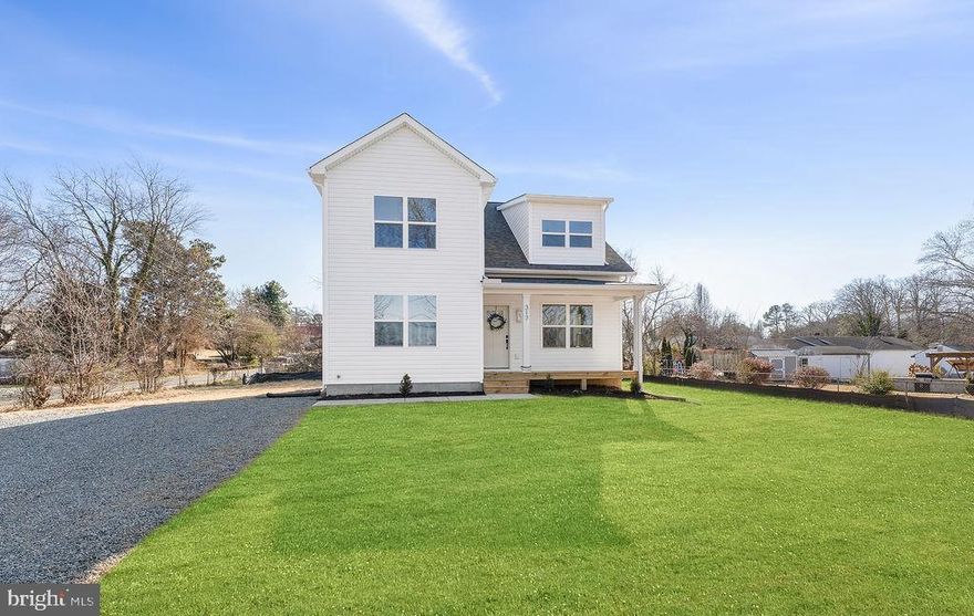 Completed new construction – The Dogwood by Ironwood Homes, set on 0.36 acres in the heart of downtown Gordonsville! This modern interpretation of country chic blends timeless charm with thoughtful design, creating the perfect space for a growing family. The open-concept layout features a dramatic two-story living room filled with natural light, a farmhouse sink, and custom   details. The main-level primary suite offers a spa-like retreat with a free-standing tub and designer tile work. Upstairs are three additional bedrooms, while the gourmet kitchen boasts quartz countertops,stainless steel appliances, and luxury vinyl plank flooring throughout. Brand new community pool close by! grass is virtually placed