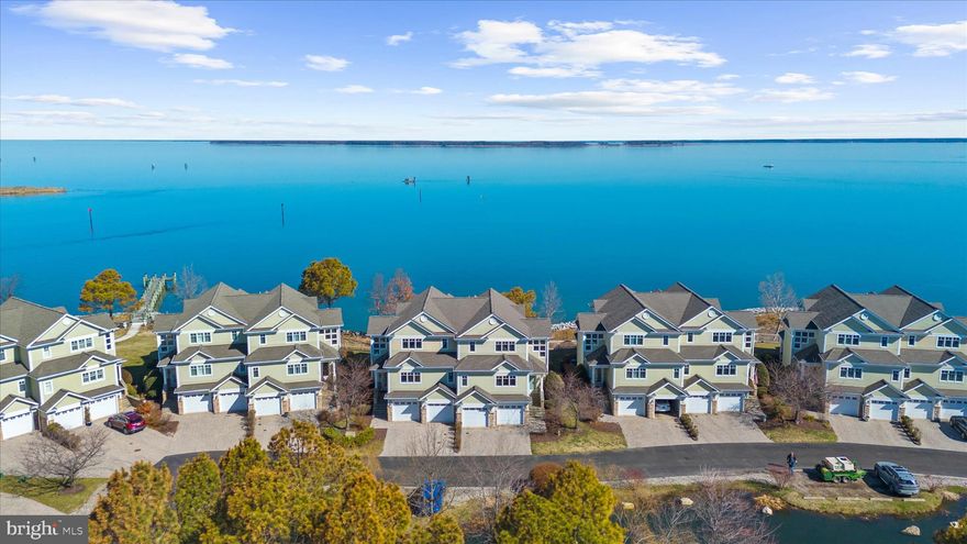 "STAY AND PLAY" THEN "LOCK AND LEAVE" EASTERN SHORE WATERFRONT LIVING NEAR THE BAY BRIDGE!
Pass through the iron security gate, travel along the elegant drive, and pull up to stunning waterfront "end unit" residence on the Chester River!  Welcome to 518 Narrows Pointe Drive, a waterfront property in the beautiful 38 unit community in proximity to the Bay Bridge and in the prime location for taking in holiday fireworks, magical daily sunrises, and all sorts of eastern shore wild life--Eagles, fox, deer, herons and more! The residence, with a newly painted interior (all ceilings, walls, trim) is flooded with natural light and offers multiple outdoor decks/porches (many with electric privacy window screens), including off the living room, kitchen and primary bedroom.  And there are water views on both sides--expansive views of the Chester River on one and the Safe Harbor Marina on the other, which separately offers membership for a pool, fitness center, boat slips, restaurants and more! This particular property has some of the BEST BROAD VIEWS OF THE BOATS IN THE CHANNEL in the entire community! NOTE: Seller providing a $1000 credit at closing which buyer may apply to a one year membership for the Safe Harbor pool/gym. Additionally, Narrows Pointe boasts two of its own community piers--one fishing and one kayak launch, and a boat dock/slip (one pier w/ 3 slips), all taken care of by the HOA. As beautiful inside as out, the residence's interior floors are primarily hardwood, with exception of carpeted bedrooms and tiled bathrooms. The counter tops of the kitchen and baths are granite with updated brushed-nickel hardware and the appliances (including a wine fridge) are stainless. There is a  sizable pantry and stackable washer dryer. The airy kitchen offers a gas stove top, ample island seating as well as a separate open concept dining area with spectacular views of the water.  Whether you prefer a shower with multiple shower heads, a jetted tub or a tub/shower combination, you have all at your disposal! And don't forget about the floor to ceiling stone gas fireplace, perfect for sitting by on chilly winter nights.   You also have a two car attached garage, just resurfaced in March 2026, off street driveway parking & NEW ROOF PUT ON IN 2024!  The lowest level off the garage provides you space to make a second family room, recreation room, play room or more (the owners utilize it currently as a home gym).
Need to store things? The sellers have gone to great lengths to add many custom storage areas including California Closets in the primary bedroom, garage closets and hanging storage, and all bedrooms offer large closet space, many walk-ins. Plus there is a large dry crawl space accessible upon entering the property bottom floor via the garage.
This property is only 20 minutes to Annapolis in one direction, 20 to Easton in the other, 45 min to BWI Airport, 55 min to Washington DC, 1 1/2 hours to the beach at Ocean City MD!
This is perfect for either a year round home or a weekend getaway.
THE HOA PROVIDES MANY SERVICES; A GATED COMMUNITY FOR SECURITY, EXTERIOR PROPERTY MAINTENANCE,  GROUND MAINTENANCE, COMMON AREA PONDS, PAVED PRIVATE ROAD, FLOOD INSURANCE,  FISHING PIER, WATER ACCESS FOR KAYAK/PADDLEBOARD, AND MORE! IT MAKES LIVING HERE VIRTUALLY HASSLE FREE!
Please see private agent remarks for a list of seller upgrades/ages of/costs of utilities, documents for association covenants and restrictions, etc.
Sellers may require a lease back to secure their next home.