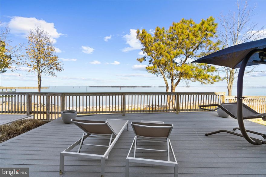 "STAY AND PLAY" THEN "LOCK AND LEAVE" EASTERN SHORE WATERFRONT LIVING NEAR THE BAY BRIDGE!
Pass through the iron security gate, travel along the elegant drive, and pull up to stunning waterfront "end unit" residence on the Chester River!  Welcome to 518 Narrows Pointe Drive, a waterfront property in the beautiful 38 unit community in proximity to the Bay Bridge and in the prime location for taking in holiday fireworks, magical daily sunrises, and all sorts of eastern shore wild life--Eagles, fox, deer, herons and more! The residence, with a newly painted interior (all ceilings, walls, trim) is flooded with natural light and offers multiple outdoor decks/porches (many with electric privacy window screens), including off the living room, kitchen and primary bedroom.  And there are water views on both sides--expansive views of the Chester River on one and the Safe Harbor Marina on the other, which separately offers membership for a pool, fitness center, boat slips, restaurants and more! This particular property has some of the BEST BROAD VIEWS OF THE BOATS IN THE CHANNEL in the entire community! NOTE: Seller providing a $1000 credit at closing which buyer may apply to a one year membership for the Safe Harbor pool/gym. Additionally, Narrows Pointe boasts two of its own community piers--one fishing and one kayak launch, and a boat dock/slip (one pier w/ 3 slips), all taken care of by the HOA. As beautiful inside as out, the residence's interior floors are primarily hardwood, with exception of carpeted bedrooms and tiled bathrooms. The counter tops of the kitchen and baths are granite with updated brushed-nickel hardware and the appliances (including a wine fridge) are stainless. There is a  sizable pantry and stackable washer dryer. The airy kitchen offers a gas stove top, ample island seating as well as a separate open concept dining area with spectacular views of the water.  Whether you prefer a shower with multiple shower heads, a jetted tub or a tub/shower combination, you have all at your disposal! And don't forget about the floor to ceiling stone gas fireplace, perfect for sitting by on chilly winter nights.   You also have a two car attached garage, just resurfaced in March 2026, off street driveway parking & NEW ROOF PUT ON IN 2024!  The lowest level off the garage provides you space to make a second family room, recreation room, play room or more (the owners utilize it currently as a home gym).
Need to store things? The sellers have gone to great lengths to add many custom storage areas including California Closets in the primary bedroom, garage closets and hanging storage, and all bedrooms offer large closet space, many walk-ins. Plus there is a large dry crawl space accessible upon entering the property bottom floor via the garage.
This property is only 20 minutes to Annapolis in one direction, 20 to Easton in the other, 45 min to BWI Airport, 55 min to Washington DC, 1 1/2 hours to the beach at Ocean City MD!
This is perfect for either a year round home or a weekend getaway.
THE HOA PROVIDES MANY SERVICES; A GATED COMMUNITY FOR SECURITY, EXTERIOR PROPERTY MAINTENANCE,  GROUND MAINTENANCE, COMMON AREA PONDS, PAVED PRIVATE ROAD, FLOOD INSURANCE,  FISHING PIER, WATER ACCESS FOR KAYAK/PADDLEBOARD, AND MORE! IT MAKES LIVING HERE VIRTUALLY HASSLE FREE!
Please see private agent remarks for a list of seller upgrades/ages of/costs of utilities, documents for association covenants and restrictions, etc.
Sellers may require a lease back to secure their next home.