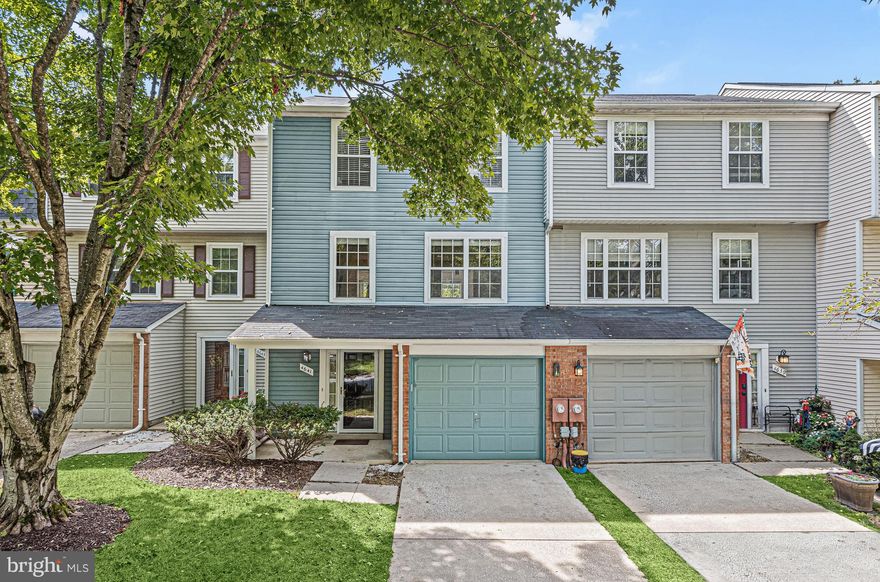 Offer Deadline Sunday, 9/17 @12pm.
Discover the perfect blend of modern living and natural tranquility in this impressive 3-level townhome. Nestled against a serene open community space, surrounded by inviting walking trails and mature trees, this home offers the best of both worlds. Step inside, and you'll be greeted by a family room with a cozy fireplace that sets the stage for intimate gatherings and movie nights. Plus, it offers convenient access to the brick patio, making it an ideal spot for outdoor barbecues and relaxation. Upstairs, an inviting open concept living and dining room, adorned with stylish planked flooring is ideal for entertaining and everyday living. The adjacent kitchen boasts new stainless steel appliances, providing both form and function, along with ample counter space, a convenient pantry, and a table space for casual dining. Slide open the glass door, and you'll find yourself on a large deck, a delightful extension of the kitchen, perfect for outdoor gatherings and relaxation. Upstairs, the spacious primary bedroom awaits, featuring a double closet and an en-suite bath, providing a private oasis to unwind. Two additional bedrooms and a full bath conclude the upper level. Completing the package, a one-car garage provides convenient parking and additional storage space. Enjoy being in close proximity to all that Howard County has to offer. Columbia, and Ellicott City offer a vast variety of shopping, dining, and entertainment options. Outdoor recreation awaits you at Patapsco State Park, Waverly Woods Golf Course, Turf Valley Golf Club, Centennial Park, and more! Major commuter routes include MD-32, MD-144, US-29, MD-99, Route 40, and I-70. Property Updates: stainless steel appliances, deck, HVAC, roof, gutters, and more!