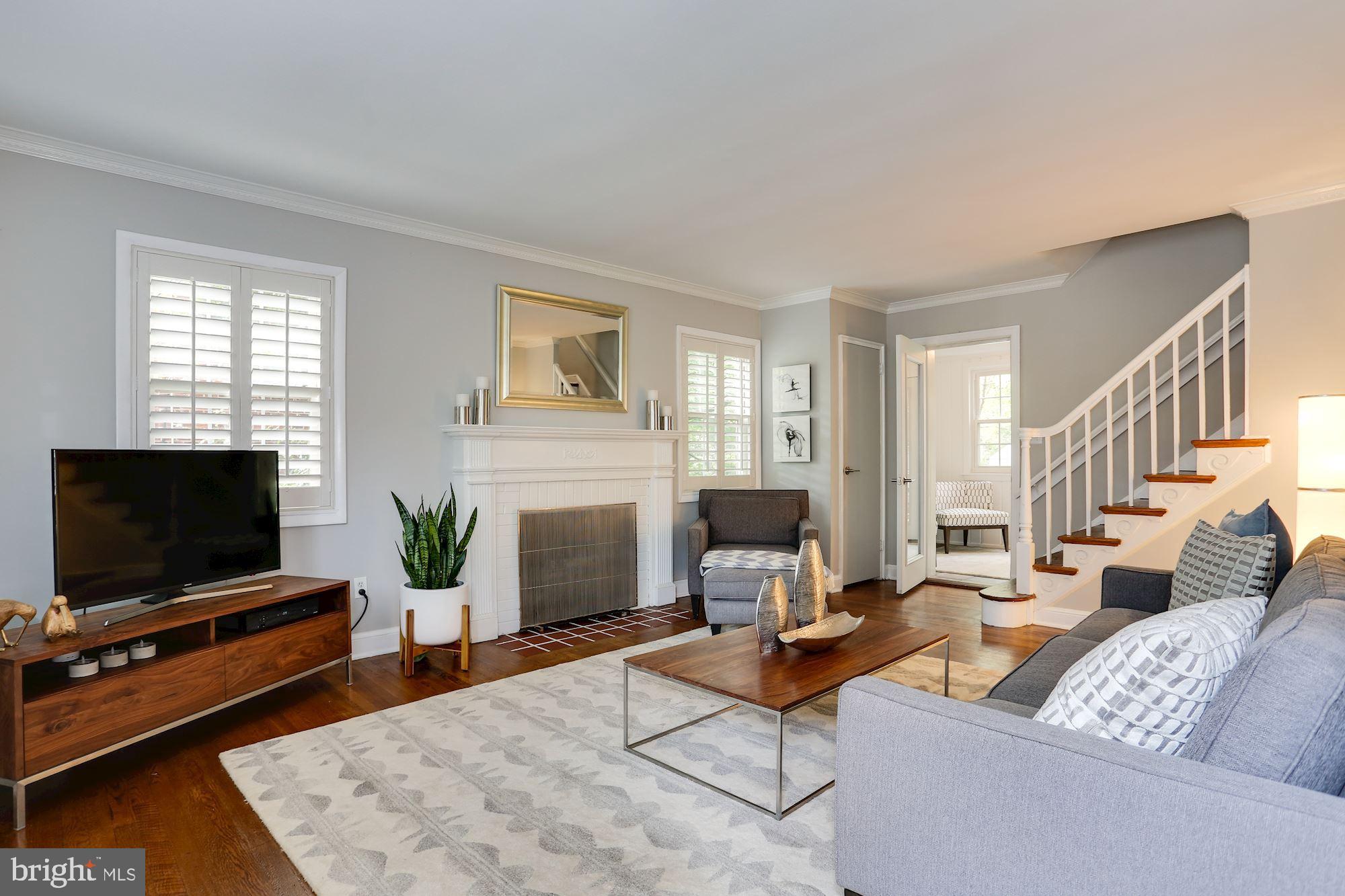 OPEN HOUSE 2PM -4 PM on Sunday October 6, 2019. Gorgeous Brick Solid Colonial in Chevy Chase featuring 3 bedrooms upstairs. Meticulously kept inside and out. Large living room with fireplace; pretty sunroom/office that leads to private, fenced back yard and patio perfect for entertaining; separate dining room ; hardwood floors throughout; fully finished basement with lots of rec/storage space and 1/2 bath. Distinctive touches throughout. Close to restaurants, shopping, two metros and 495, park, and to all the amenities of Bethesda, Chevy Chase & DC. Move in ready! Located on service Rd.