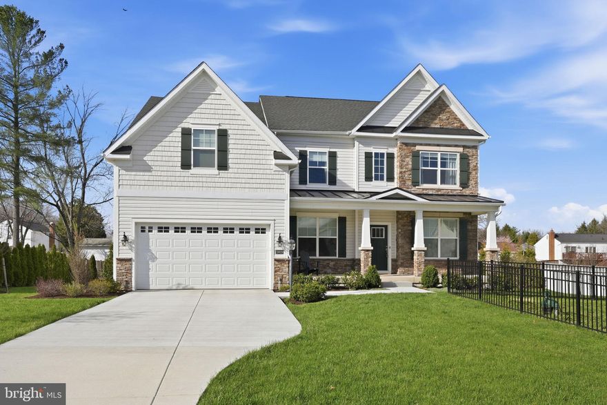 Welcome to this beautifully upgraded and spacious home in sought-after Westerly Grove, one of Poolesville’s premier single-family communities. Built in 2022 and set on roughly half an acre, this impressive residence offers over 5,500 square feet across three finished levels, with 7 bedrooms and 5 full bathrooms. This is the popular Azalea model by Lennar, known for its thoughtful layout and modern design.
The open main level is anchored by a great room with a modern fireplace and a wall of windows overlooking the landscaped, tree-lined backyard and large side yard. Step outside to a hardscaped patio that creates a private setting for relaxing or entertaining. The gourmet kitchen features an oversized island, designer cabinetry, stone countertops, stainless steel appliances, a large pantry, and a separate scullery. A spacious breakfast room provides flexibility as a casual dining area or additional sitting space. The main level also includes a formal living room, dining room, mudroom, and a bedroom with a full bath, ideal for guests or multigenerational living.
Upstairs, the primary suite offers a tray ceiling, a large walk-in closet, and a spa-style bath with an expansive shower. Four additional bedrooms complete the upper level, including one with a dual-entry bath, along with a hall bath and a conveniently located laundry room.
The finished walk-up lower level adds even more living space with a large rec room, media room, a 7th bedroom, and a full bath.
A two-car garage with ample storage completes the home.
Enjoy a prime location surrounded by open space and served by top-rated schools. Nearby, you’ll find country clubs, local vineyards, scenic trails, and easy access to the natural beauty that makes this area so special.