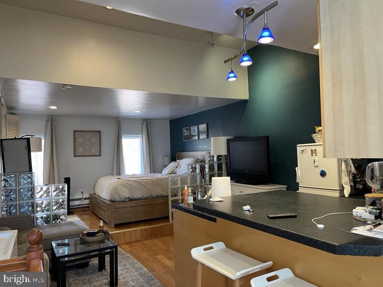 Beautiful apartment in the heart of Center City. The unit features open layout with raised bedroom area and full view windows of Center City and big closet space. High ceiling living room with beautiful hardwood floor, overlooking the modern kitchen with breakfast island. Modern bathroom, hardwood flooring throughout the unit. Private Washer and dryer in unit. convenience location, walking distance to Jefferson hospital, university of the arts, broad st subway, and Kimmell center. walking distance to restaurants and shops as well.