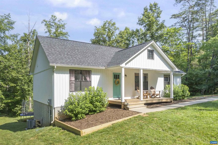 Sweet Modern Farmhouse within Albemarle County and on more than 3.5 acres! Nicely appointed home with one level living AND a huge Rec Room in the basement with a full bathroom and home office AND loads of storage space. All the nice details are here: granite countertops, vaulted ceilings, generous closets and privacy on the partially wooded lot. No HOA here. Only 15 minutes to Cville, Wegmans and 64.,Birch Cabinets,Granite Counter,Solid Surface Counter