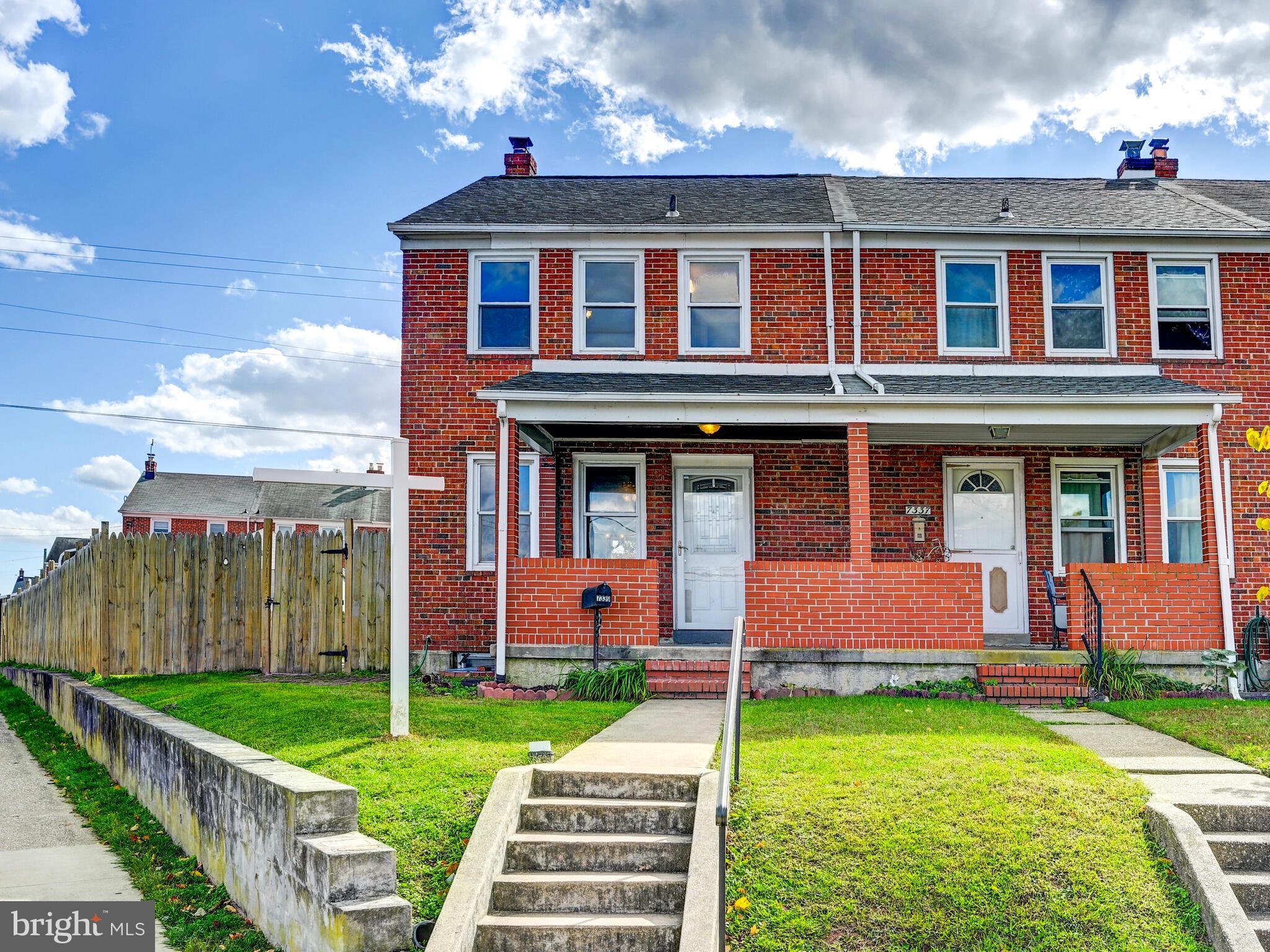 Welcome to 7339 Conley Street in East Baltimore! This charming end-of-group rowhome sits on a spacious corner lot and offers exceptional outdoor space, including a fully fenced yard with a 6-foot privacy fence, a brick patio, and plenty of convenient street parking right at your doorstep. Freshly painted with brand-new carpet installed in October 2025, this home is move-in ready while still offering room for cosmetic updates and instant sweat equity.  Step onto the welcoming covered front porch and into a bright, open Living and Dining Room filled with natural light. The galley-style Kitchen provides direct access to the rear patio and lower level—perfect for entertaining or everyday convenience. Upstairs, you’ll find three generous Bedrooms and a refreshed Full Bathroom featuring a tiled shower and luxury vinyl plank flooring. The spacious lower level offers great flexibility for a Family Room, 4th Bedroom, or Home Office—ready to suit your lifestyle.  Ideally located just minutes from I-95 and I-695, and only 15 minutes from downtown Baltimore, you’ll enjoy easy access to major shopping, dining, and commuting routes. Don’t miss your chance to make this home yours—schedule your private showing today!
