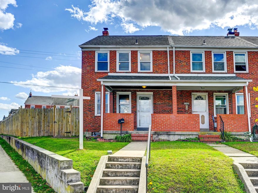 Welcome to 7339 Conley Street in East Baltimore! This charming end-of-group rowhome sits on a spacious corner lot and offers exceptional outdoor space, including a fully fenced yard with a 6-foot privacy fence, a brick patio, and plenty of convenient street parking right at your doorstep. Freshly painted with brand-new carpet installed in October 2025, this home is move-in ready while still offering room for cosmetic updates and instant sweat equity.  Step onto the welcoming covered front porch and into a bright, open Living and Dining Room filled with natural light. The galley-style Kitchen provides direct access to the rear patio and lower level—perfect for entertaining or everyday convenience. Upstairs, you’ll find three generous Bedrooms and a refreshed Full Bathroom featuring a tiled shower and luxury vinyl plank flooring. The spacious lower level offers great flexibility for a Family Room, 4th Bedroom, or Home Office—ready to suit your lifestyle.  Ideally located just minutes from I-95 and I-695, and only 15 minutes from downtown Baltimore, you’ll enjoy easy access to major shopping, dining, and commuting routes. Don’t miss your chance to make this home yours—schedule your private showing today!
