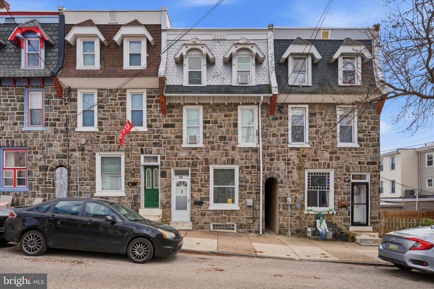 Check out this beautiful 5-bedroom, 2-bath stone townhome in the heart of Manayunk! The main level features a bright, spacious living room with hardwood floors, neutral tones, and abundant natural light, flowing into a large dining room—perfect for entertaining.  The updated kitchen offers tile flooring, wood cabinetry, granite countertops, a tile backsplash, recessed lighting, and newer appliances. A recently added full bathroom is located at the rear of the home for added convenience.  The second floor includes three well-sized bedrooms with hardwood flooring and ample closet space, along with a full bathroom. The third floor features two additional bedrooms.  Enjoy a fully fenced backyard with a patio and stone landscaping—ideal for outdoor gatherings. Additional highlights include central air, updated electrical, and newer windows.  Conveniently located just a 5-minute walk to Main Street, with easy access to shops, dining, and entertainment!