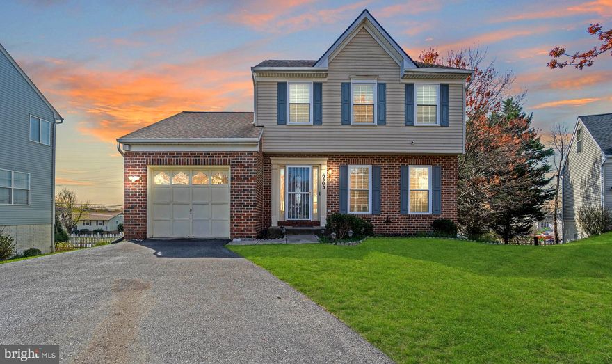 OFFER DEADLINE: MONDAY, APRIL 8TH AT 12PM.  Move-In Ready.  Inexpensive HOA! Sellers are immaculate!  Exquisite cul-de-sac colonial home nestled in the serene enclave of the highly sought-after GreenSpring II Community.  This meticulously maintained home boasts a wealth of features that cater to both comfort and style.  A combination brick front adds character to the facade, complemented by a single-car garage and a spacious three-car driveway for ample parking. Step inside to find gleaming hardwood floors in the living and dining rooms, while luxury laminate wood flooring adorns the foyer and extends throughout the main and upper levels—no carpet ensures easy maintenance. The kitchen is a chef's delight, featuring stainless steel appliances, a double sink, and a window over the sink allowing natural light to flood the space. A deck off the kitchen provides a perfect spot for al fresco dining. Gather around the fireplace in the family room, creating a warm and inviting ambiance for relaxation and entertainment.  Enjoy the new composite deck (installed in 2019) overlooking the community's fenced backyard, offering a private oasis for outdoor enjoyment.  The walk-out basement boasts tile flooring throughout and features a bedroom, a full bathroom, and a common area, providing ample space for guests or additional living quarters.  Upgrades over the years include replaced windows, replaced roof (2016), replaced hot water heater (2018) and replaced HVAC (2018)! Ceiling fans, blinds, and rods convey with the home. Exclusions: Please note that cameras do not convey with the property.  Convenient access to amenities, parks, schools, and shopping centers. Easy commuting with nearby access to major roads and highways. Priced to sell and offering an unparalleled lifestyle, this exceptional home presents a rare opportunity to live in comfort and luxury. Schedule your showing today and make this your dream home!