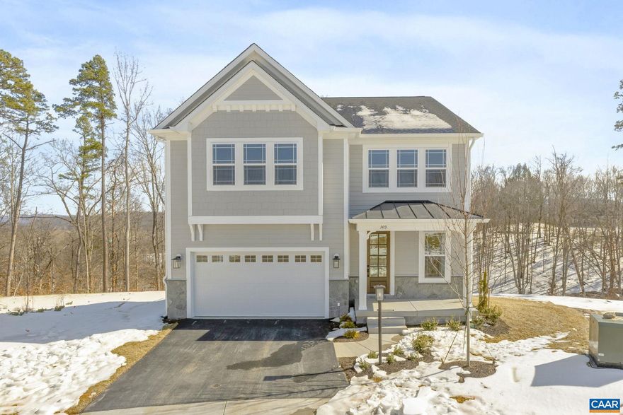 This move-in ready Marigold floor plan offers a well-balanced layout with extra-spacious bedrooms, each featuring a large closet. The main level features a generous open living space with a stone fireplace and decorative faux wood beams in the family room. The L-shaped kitchen includes a center island, beverage center, walk-in pantry, and pocket office, along with a nearby mudroom, drop zone, and half bath. A covered porch and rear deck extend the living space outdoors, and the garage includes a pedestrian door for added convenience. Upstairs, the primary suite spans nearly 18? x 20? and is complemented by an expansive walk-in closet measuring approximately 17? x 15?. Two additional large bedrooms share a split hall bath, while the fourth bedroom includes its own private bath. A centrally located laundry room and two linen closets complete the upper level. The home also includes a large unfinished basement offering future expansion potential. Located on a cul-de-sac homesite in Belvedere, residents enjoy access to community amenities including parks, playgrounds, a dog park, and nearby trail connections, along with close proximity to the Rivanna trailhead and SOCA Fieldhouse. Photos shown are of the actual home.,Granite Counter,Maple Cabinets,Painted Cabinets,White Cabinets,Wood Cabinets,Fireplace in Family Room