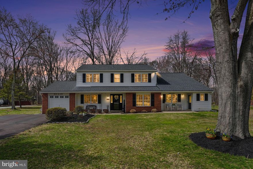 Set on a picturesque 0.62-acre lot backing to peaceful woods, this beautifully expanded 5-bedroom, 3.1-bath home in Hatfield offers exceptional space, versatility, and comfort.
A thoughtfully designed 2-story addition provides the perfect setup for multi-generational living, featuring a true first-floor in-law suite with private entrance and vestibule. This spacious suite includes a large bedroom/living area with wood floors, walk-in closet, and a stunning oversized bathroom complete with vaulted ceiling and skylight, zero-entry tiled shower, Jacuzzi jetted tub, double bowl vanity, make-up area, linen closet, storage room, and direct access to the rear patio.
The main level is ideal for both everyday living and entertaining. The spacious kitchen features ceramic tile flooring, a wood ceiling, LED lighting (2022), stainless steel gas range (2025), built-in microwave hood, dishwasher, white refrigerator, and generous pantry. It opens seamlessly to the inviting family room, highlighted by a gas fireplace (2019), chair rail, ceiling fan, LED perimeter lighting, and French doors leading to the covered patio. Upgrades also include a new roof (2021), dual HVAC systems (2022, 2026), and hot water heater (2026).
Step outside to the covered patio and enjoy sunset views, outdoor dining, entertaining, or simply relaxing while overlooking the serene, wooded backdrop.
Additional main floor features include a formal dining room, media room, powder room, laundry room with access to the rear yard, garage entry, and convenient access to the in-law suite.
The second floor offers four bedrooms, including the expanded primary bedroom suite with full bathroom, walk-in closet, and attached office/sitting room, along with a full hall bathroom, linen closet, and both walk-in and pull-down attic access.
Combining a flexible layout, impressive addition, and a tranquil setting in a desirable Hatfield location, this home delivers the space and lifestyle today’s buyers are seeking.