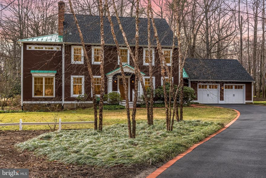 Located on one of the most desirable streets in Annapolis, this  home offers a one acre private, wooded setting. Its light filled interior has been enhanced by high ceilings &  modern additions.  Updates include  HW floors,  kitchen with top of the line appliances,  double  islands with granite counters, custom cabinets and hand carved wooden breakfast bar. The family room and sunroom offer walls of windows, gas stoves and open to the outdoors. 5 BRs including generous master suite with, custom walk-in master closet with island and W/D. Black out blinds, plantation shutters, main level home office, full house generator. Minutes from City Dock.