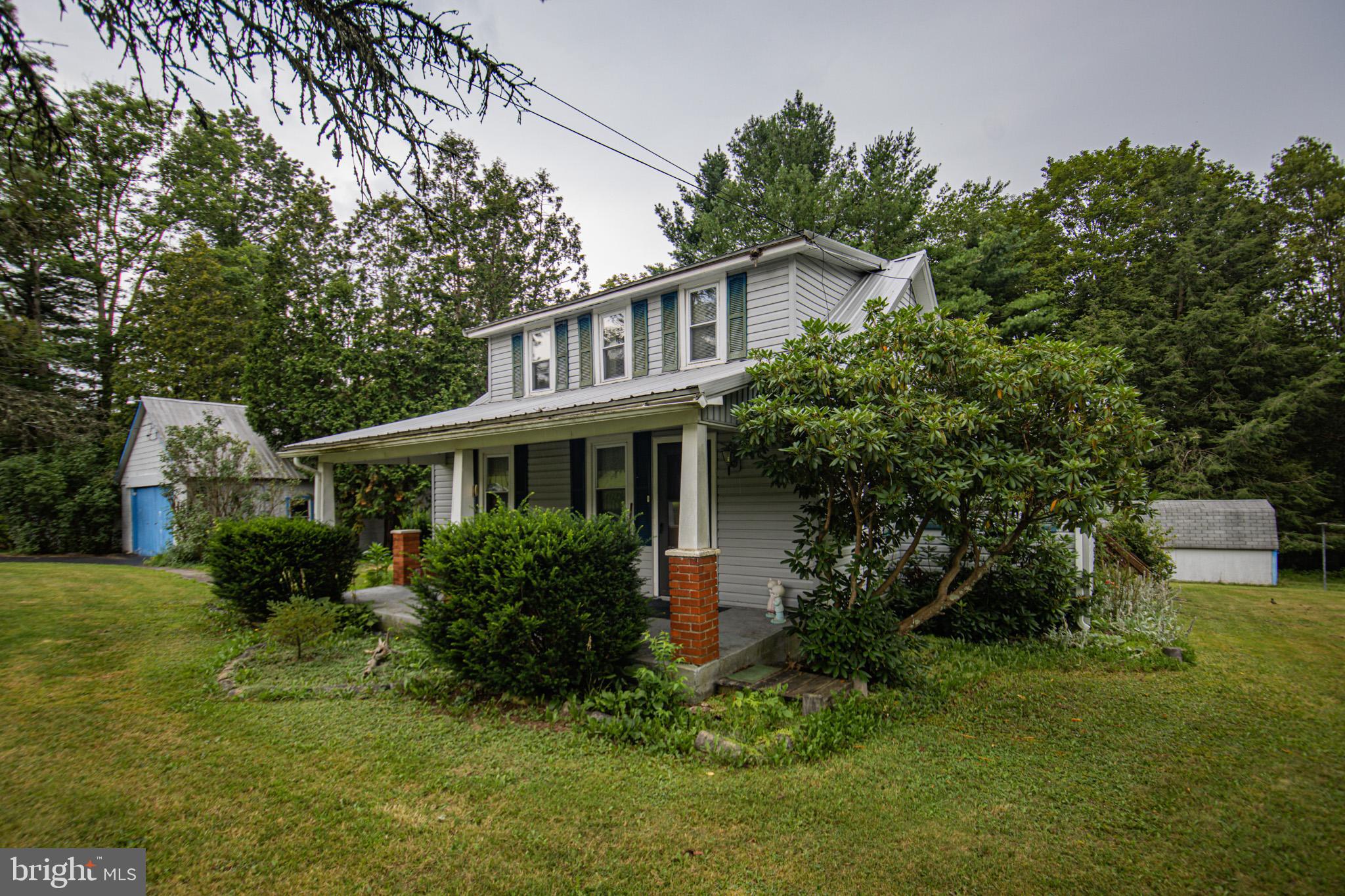 Welcome to your charming retreat—a delightful 2-bedroom, 1-bath house that perfectly balances comfort with functionality. Nestled on a mostly level 1.18-acre lot, this property offers ample outdoor space for gardening, recreational activities, or simply enjoying nature.
As you step inside, you'll be greeted by a warm and inviting atmosphere. The home's layout features a versatile loft area that provides an additional living space for relaxation, an office, or playroom—perfectly complementing the cozy living quarters below.
Enjoy peace of mind with the home's newer metal roof, designed for durability and low maintenance. The upgraded electric service ensures that you have modern conveniences while maintaining the home's classic charm.
Outside, a detached garage offers convenient storage or workshop space, adding to the property’s appeal. This home is being sold strictly As-Is, allowing you to personalize it to your taste while taking advantage of its solid foundation and potential.
Don’t miss your chance to own this wonderful property—schedule a viewing today and envision the possibilities that await you!