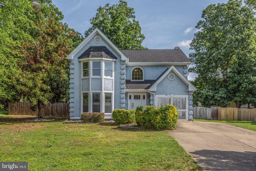 Craftsman style renovated home.  Main floor renovated to include new craftsman style door, gray wood laminate throughout the main level, new windows on the first floor, and renovated kitchen with white shaker style cabinets, new microwave, and granite countertops.  The garage has been converted to main floor home office with built-in cabinetry, side entry door, and separate mud room plumbed for a separate washer and dryer.  Upper level features 3 generous sized bedrooms with new carpet and an extra large primary bathroom with vaulted ceilings and a walk in closet (Primary bathroom in the process of renovations but will be completed by settlement).  New roof and newer hot water heater.