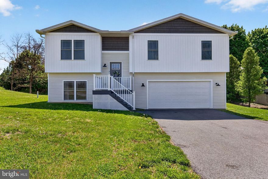 NEW PRICE - NEW PROFESSIONAL PHOTOS - NEW OPPORTUNITY   Beautiful move-inready home now offered at $347,500.  Seller may conisder buyer cost assistance with acceptable offer.  Don't miss this price-improved, refreshed opportunity.  Welcome to this beautifully deisgned newer home, built in 2022, offering the perfect blend of style, space, and comfort on a generous .36 acre lot in a quiet neighborhood just minutes from Shippensburg University.  Step inside to an open-concept layout with high ceilings, creating a bright and airy feel throughout the main living space.  The heart of the home features a stunning kitchen with custom cabinetry, soft-close drawers, floating shelves and a large island complete with storage, built-in outlets and convenient trash compartments perfect for everyday living and entertaining.  All SS appliances, including washer and dryer which all convey with the home making this truly move-in-ready.  Enjoy the durability and modern look of luxury vinyl plank flooring complemented by cozy carpeted bedrooms.  The spacious primary suite offers a privaate retreat with a double vanity and thoughtfully designed shelving between sinks.  The walk-out bi-level lower level provides a versatile second living space ideal for a family room, home office, gym or guest area with direct access to a covered patio.  Upstairs, step out onto the deck off the dining area, perfect for relaxing or hosting.
Additional Highlights Include:  3 Bdrm/ 2.5 baths; 2 car garage; ADT security system; Fold in windows for easy cleaning; Beautiful mature trees offering privacy and charm.
With its flexible layout, modern finishes and unbeatable location just minutes from shopping, dining and commuter routes, this home truly has it all.  Schedule your showing today!