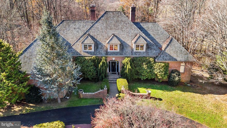 Welcome to 141 St. Moritz Drive, a gracious custom brick estate nestled within L' Hermitage, one of Delaware's premier communities in the heart of Greenville. This breathtaking property offers a seamless blend of architectural elegance, modern upgrades, and serene surroundings on 3.84 impeccably landscaped acres.
Step through the grand entrance to discover exquisite craftsmanship throughout. Nine-foot ceilings, gleaming hardwood floors, and custom molding elevate every room. The main living room, with its cozy fireplace and floor-to-ceiling doors and windows, bathes the space in natural light and invites you to step out onto the expansive, newly installed deck overlooking the lush grounds.
The heart of the home is the newly redesigned kitchen, a chef’s dream with custom cabinetry, a spacious island, new induction cooktop, and a state-of-the-art Bosch wall oven. The sunlit eat-in area, framed by large windows, creates the perfect setting for morning coffee. A generous butler’s pantry with a wet bar connects seamlessly to the formal dining room, making entertaining a delight.
The first-floor primary suite is a sanctuary of luxury, featuring a spacious bedroom, a spa-like bathroom, and tranquil views of the estate’s landscaped grounds. Upstairs, you’ll find three additional oversized bedrooms, two full bathrooms, a versatile bonus room, and a cedar closet with abundant storage space.
The finished lower level, complete with a walkout, offers endless possibilities. It includes a fifth bedroom and full bathroom, a home office, entertainment areas, and additional storage. An oversized three-car garage, whole-house generator, and over two acres of newly fenced backyard (with room for a pool) add convenience and peace of mind.
Situated in the prestigious L' Hermitage community, this home offers a rare combination of privacy, elegance, and modern amenities. Incredible location. Distance to Major East Coast Cities:
Philadelphia - 35 miles
New York - 125 miles
Baltimore - 75 miles
Washington - 110 miles
Schedule your private tour today to experience this extraordinary property firsthand!