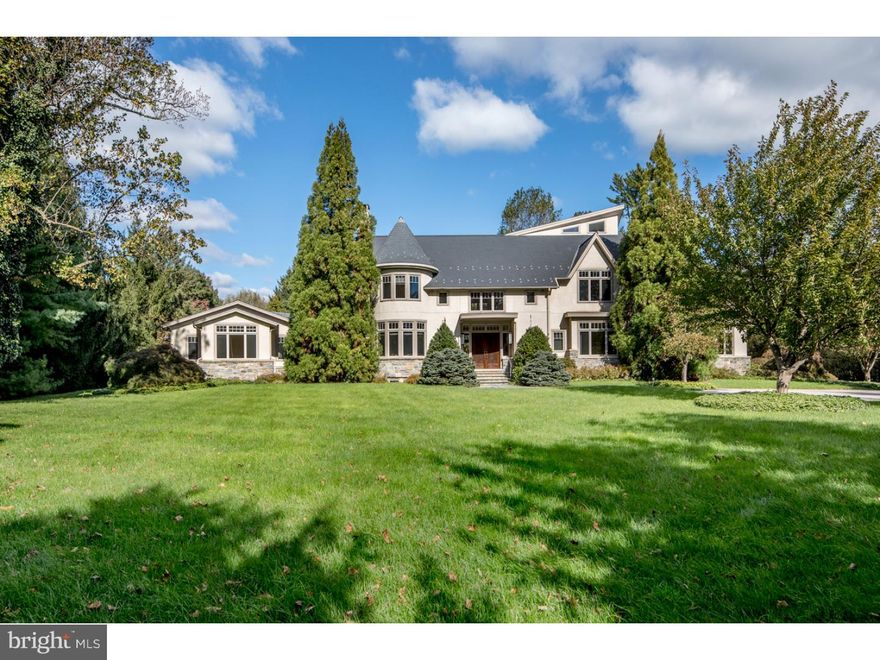 A remarkable team of talent, builder Frank Zadlo in collaboration with architect Matthew Milan, conceived & created what is one of the most distinctive residences in Villanova. Enveloped by greenery, this magnificent 6 bedroom 6.5 bath showplace, approached from a graceful drive beyond stone pillars, sits grandly on 2.31 acres, affording utmost privacy & outdoor living at its best. Expansive paver patios with a stone fireplace, a beautiful in-ground swimming pool, tennis court, stretching lawn & sweeping views enhance the blissful environs, providing an idyllic backdrop for enjoying the outdoors & entertaining amid a stunning landscape.   Those who seek the finer things in life, and optimal comfort for their loved ones, will appreciate the care & attention that went into the thoughtful details and gracious flow of this exquisite estate home. Every feature was deliberately considered & impeccably executed, from the premium-quality woods, stones, finishes & fixtures to radiant heat floors, architectural ceilings & skylights, state-of-the-art technology & systems such as central air, central vac, air and water filtration, security, etc. The spectacular, soaring reception gallery with a striking wood staircase & towering columns is truly a masterpiece. This crowning jewel introduces 3 generous levels of elegant living space that exude character with a contemporary flair, all awash with natural light.   Mingle with guests over cocktails in the romantic living room graced by tasteful built-ins & fireplace, and effortlessly host a crown in the gracious dining room with coffered ceilings. The fabulous sun-bathed kitchen appointed with all the premium bells & whistles for the chef has plenty of room for everyone to gather casually. Coffee never tasted better than in the glass-walled breakfast room overlooking the rear oasis. A round-ceilinged den with a built-in entertainment center & fireplace flanked by oversized windows has a special ambience for movie nights. Escape to your serene master sleeping quarters with a sitting area, custom-outfitted dressing closet & en-suite bath/spa retreat with a hot tub.   A den/study/library, loft, laundry, spacious guest suites, an amazing lower level w/a media room, gym/fitness room, sauna, wine cellar & full bath, and a 3-car garage are other highlights that make this an exemplary luxury home. Topping the allure is the superior location in the top Lower Merion school district w/close proximity to Center City.
