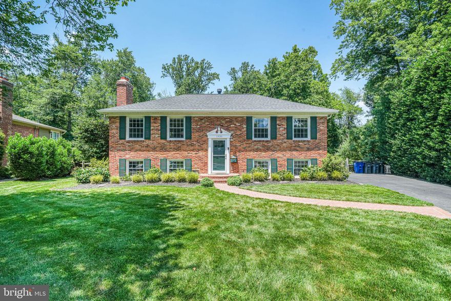 Welcome to this thoughtfully-designed home on a quiet cul de sac in the Foxhall neighborhood of McLean. With immaculate updates throughout, enjoy light from abundant windows, gorgeous hardwood floors, multiple fireplaces, a chef's kitchen and dining room opening to a beautiful deck with private, tree-lined views, an expansive rolling backyard and more. This split-level features an open living space on the upper level with room to cozy up near the marble-lined wood-burning fire, host company and friends, and just relax and hang. The open chef's kitchen boasts custom cabinetry, white quartz countertops, top-of-the line appliances including a Bertazzoni Oven and separate drink fridge, a picture window over the farmhouse sink, and an eat-in island. The open dining area includes ample dining space, custom built-ins for extra storage, and easy access to the oversized deck, perfect for summer-night dinners and barbecues. Find two generous and secluded bedrooms with a luxury bathroom featuring a double vanity, marble tile, and and oversized walk-in shower with custom glass doors. The lower floor provides an oversized additional living space with plentiful light from full windows, a second fireplace, custom builtins, a wet bar complete with a sink and drink fridge, updated half bath for guests, and a separate mud and laundry room. Find two additional full bedrooms/offices with an additional full bath with a tub and shower. Everything has been updated (2016 roof, 2017 HVAC, 2017 water heater, new chimney liners and attic insulation, deck 2020/2021, and more)!

Walk out onto the expansive backyard, totally secluded with trees and room to roam and play. The backyard includes a playset, a shed for storage, outdoor fire pit, and ample green space and flowering bushes. Backyard bonuses for yummy summer treats and beauty include apple trees, peach trees, blueberry bushes, a strawberry patch, and a mint patch. Direct access to Pimmit Run trails and wooded area and the McLean Little League fields. Ideally located near nature trails, the community pool, grocery stores (including Whole Foods, Trader Joe's, and Wegmans) and community attractions including Tyson's Galleria, the Mosaic District and more. Easy access into DC and major thoroughfares.