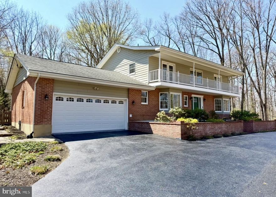 NO HOA!!!

Basement partially finished 812 sq ft. Detached Office/bonus room 

Built in 1971, this 4 Bed/2.5 Bath home is located on over 2 wooded acres features built-ins, upgraded countertops, new water treatment system, new HVAC, hardwood floors throughout the main level, 2 fireplaces, French doors, bay windows, and many upgrades.

Two car garage (attached)

Circular driveway

Main-level laundry room. The kitchen has granite countertops, an extra large walk-in pantry, upgraded cabinetry, an island with seating, a farmer's sink, and stainless steel appliances.

Finished basement with a second fireplace.

Separate & fully finished building with office and bonus room. Can be used for additional storage, workout room or garage. Has dual zone mini split for temperature control in all rooms. 550 square feet. Completed in 2023.

High speed internet. House wired with CAT 6.

2026 updates:
- Repaired & sealed driveway
- Freshly painted front porch
- Front yard cleared & hydroseeded
- Newly carpeted basement & stairs
- New epoxy paint- garage floor

Prior updates:
- water pressure tank replaced (2019)
- water heater replaced (2019)
- Fresh paint throughout house, excluding bedrooms & laundry (2026)
- Electrical panel rewired for generator compatibility (2019)
- Basement fireplace- new liner installed (2019)
- Radon mitigation system installed (2019)
- Septic pumped (2025)
- HVAC: upstairs heat replaced (2017); air handler replaced (2016)
- A/C unit installed (2015)
- Roof replaced with 50-year shingles (2009)
- Culligan water softening system, including filtered water in kitchen (year not specified)
- New AC unit installed (2024)
- Backyard landscaping hardscaping, including firepit area
- UV light system added for water treatment
- New stove installed (2022)
- Garden with established raspberries, blueberries, & asparagus
- Custom-built handrail installed
- Fully finished detached shed, now garage/storage area, plus an in-home office with mini splits (2021)
- Hall bathroom remodeled (2020)
- Master bathroom remodeled (2020)
- Ceiling fans installed in three bedrooms (2020)
- Front entry door replaced (2020)
- Solid core interior doors replaced throughout upstairs & downstairs (2020)
- Kitchen updates: new door to sunroom & garage (2019)
- Recessed lighting installed in living & den (2019)
- LED lighting added to upstairs closets (2019)
- Den upgraded with French doors & custom cabinet/bookcase (2019)
- Laundry sink & faucet replaced (2019)
- 1st floor HVAC replaced (2019)

Beautiful landscaping and hardscape. Enjoy the backyard sanctuary on the patio surrounded by trees. Gorgeous fire pit, established garden, room for playset and chicken coop!  Portable home generator hook-up. Just minutes from the Winchester Medical Center and downtown.