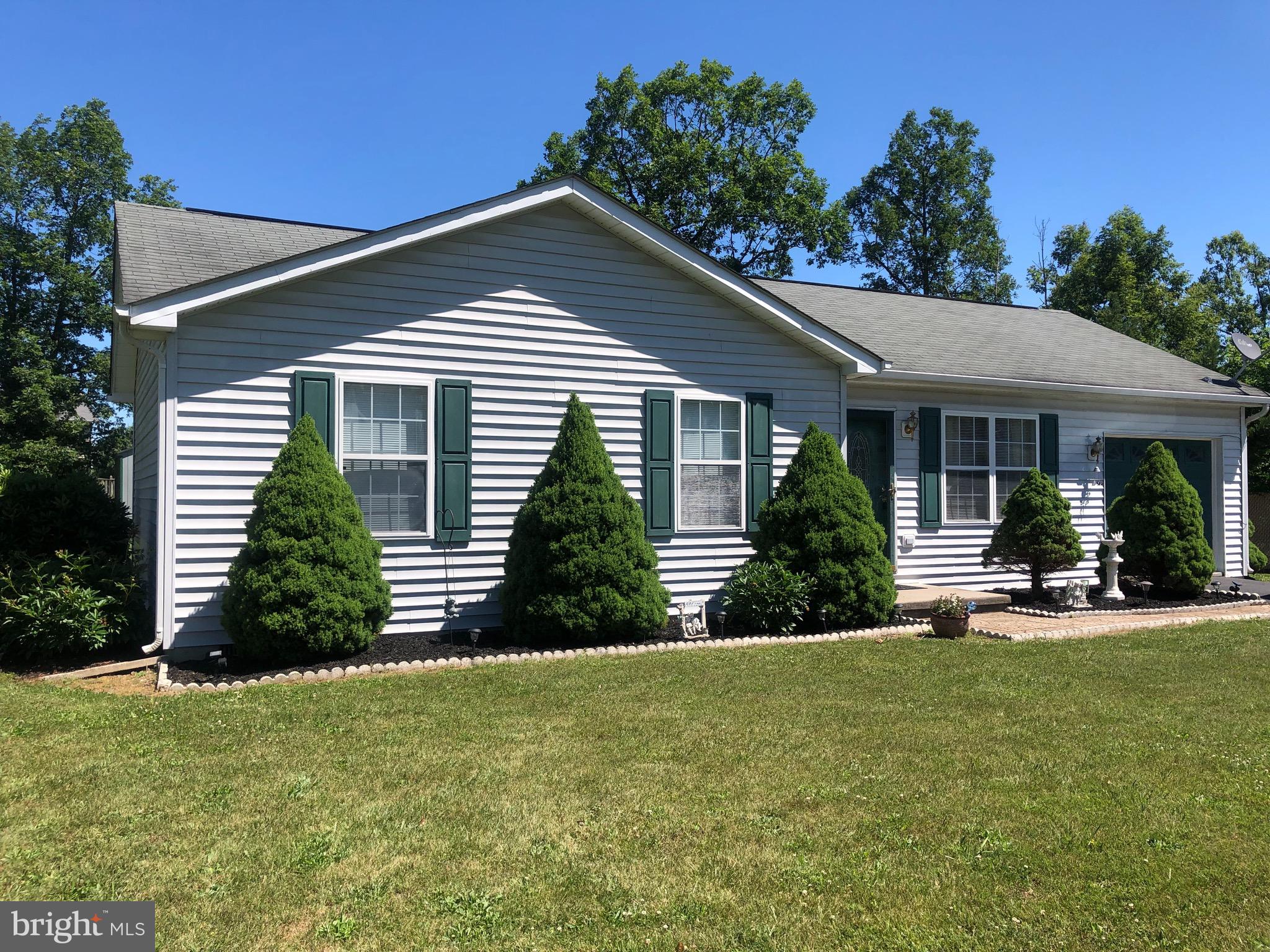 What a cute home with a great flat lot with a storage shed to convey. New heat pump installed 2018. This home comes with a water softener, and a stackable washer and dryer. Nice deck on the back, nicely landscaped, with a oversized garage, with a garage door opener.