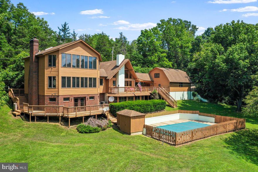 Back on the Market - No Fault of the Seller.  Shown by appointment only.  

Elevated Riverfront Living on 4.43 Acres – Contemporary Luxury on the Shenandoah River

Nestled on 4.43 pristine acres with over 680 feet of direct Shenandoah River frontage and panoramic views of the surrounding mountains & Shenandoah National Park, 127 NW Turn is a rare blend of natural beauty and refined comfort. This thoughtfully updated cedar contemporary offers peace, privacy, and timeless scenery only the Shenandoah can provide—just steps from your door.

Crafted to embrace its tranquil setting, the home offers over 3,000 square feet of light-filled space, where vaulted ceilings, exposed beams, and generous windows frame uninterrupted views of the Blue Ridge. The kitchen has been renovated with granite countertops, 2023 stainless steel appliances, and tasteful finishes that honor the home’s organic warmth.

The reimagined primary suite is a private retreat, featuring a spa-style bath with oversized walk-in shower, custom barn door, in-suite laundry, and a custom closet system. All bathrooms throughout the home have been updated with stylish tile and modern fixtures. Expansive upper and lower decks create multiple outdoor living areas ideal for quiet mornings, lively entertaining, or simply watching the river flow by.

Recent upgrades between 2023–2025 include:

* Two new HVAC systems and dual 50-gallon water heaters
* New well pump, pressure tank, and updated plumbing
* Full interior repaint, new carpeting, and refinished hardwood floors
* Exterior re-stained; chimneys, foundation, and retaining walls resealed
* Detached 2-car garage with loft game room and climate control
* Updated garage and outbuildings with new siding and doors

This is a one-of-a-kind opportunity to own over 680 feet of private river frontage and access in your very own back yard to one of Virginia’s most treasured waterways—perfect for kayaking, fishing, a relaxing tube float down the river, or simply unwinding to the rhythm of the water. While offered as-is (with disclosures regarding the pool and select fixtures), the major systems and structure have been meticulously maintained and upgraded for peace of mind.

Ideally situated for both escape and access, the property is just 30 minutes from Luray and Harrisonburg, under 2 hours from Washington, D.C., and approximately 90 minutes from Dulles International Airport—offering easy access to urban amenities while preserving the peace and seclusion of a true riverfront retreat.

Whether you're seeking a full-time residence, a refined second home, or a private sanctuary with unmatched views, **127 NW Turn delivers riverfront living in an extraordinary setting.**