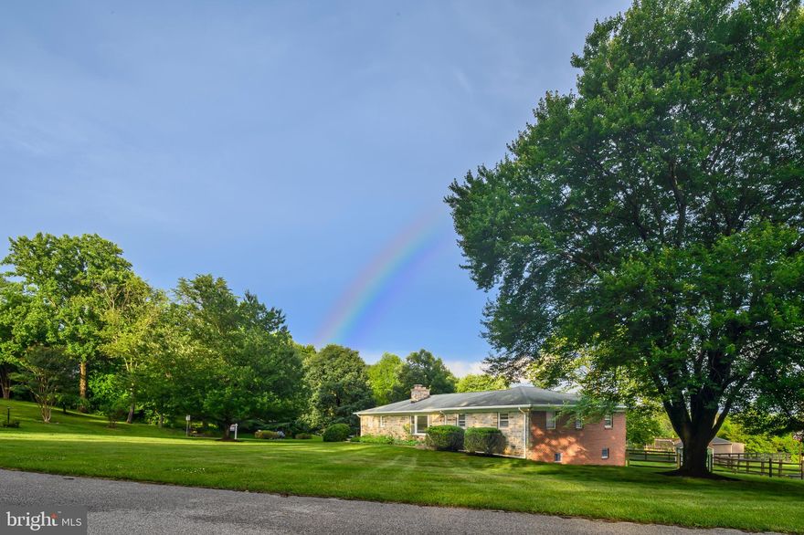 Great Price, Great location .  This solid stone and brick rancher sits on a grand corner lot in the heart of Ellicott City.   Great Schools. This house has a wealth of great memories and is primed to make more. Some of the  Great features to build your life around include : 3 large bedrooms, 2 full and 1 half bath. 2 car side load garage,  Large back yard,  Large Front yard , Hot water baseboard heat with a newer boiler (2022),  water heater 2024, quiet neighborhood. Close to all major conveniences.  Main level has large kitchen,  mud room area with extra washer/dryer hook up, living room with fresh carpet and gas fireplace. Walk out  Lower level has a retro bar, pool table and plenty of space to host parties or entertain.  Must see to believe the space in the lower level. Lower level has a slider to the backyard patio. This wonderful rancher on almost a half acre  is prefectly positioned and ready for your personal touch to make this your dream home. Are you ready to make 60+ years of memories?