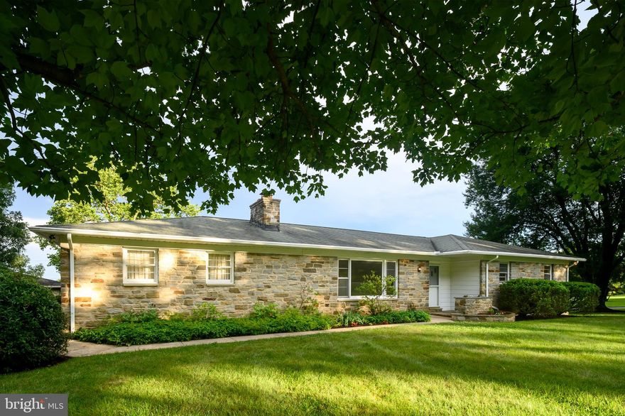 This solid stone and brick rancher sits on a grand corner lot in the heart of Ellicott City.   Great Schools. This house has a wealth of great memories and is primed to make more. Some of the  Great features to build your life around include : 3 large bedrooms, 2 full and 1 half bath. 2 car side load garage,  Large back yard,  Large Front yard , Hot water baseboard heat with a newer boiler (2022),  water heater 2024, quiet neighborhood. Close to all major conveniences.  Main level has large kitchen,  mud room area with extra washer/dryer hook up, living room with fresh carpet and gas fireplace. Walk out  Lower level has a retro bar, pool table and plenty of space to host parties or entertain.  Must see to believe the space in the lower level. Lower level has a slider to the backyard patio. This wonderful rancher on almost a half acre  is prefectly positioned and ready for your personal touch to make this your dream home. Are you ready to make 60+ years of memories?
