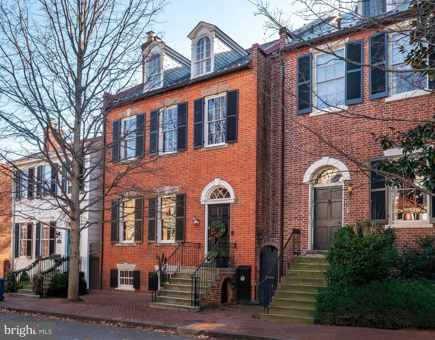 The epitome of Federal architecture and beauty, 2806 N Street was built c.1805.  The large house is approximately, 5,500 sq. ft. on four levels, and the separate carriage house/garage at 1240 28th is approximately 1,200 sq. ft. and is included in this offering.  Please refer to floor plans and the descriptions below for additional information. 

The proportions of 2806 are exceptional and grand.  The ceilings are remarkably tall, the floors gorgeous, the staircase proper and well-placed, and there are lovely tall French windows and doors throughout which flood the house with light.  The elevator and powder rooms are well-located off of the hallways.  There are nine fireplaces and two roof terraces.  Over the years, the property was renovated and expanded, yet its fine original mill work and other original details remain intact and are in excellent condition.  Early modifications to the house were made in the 1800's.  Most recently, it was meticulously restored, further expanded and modernized in 1992. 

The house sits on a large lot of approximately 4,600 sq. ft. on a most important block of N Street in the heart of Georgetown's east village.  2806 N has a large and wonderful, professionally landscaped, south-facing garden with mature plantings and trees and handsome brick patios and walkways which may be easily accessed from various rooms in the house. 

1240 28th Street was built in 1992 in the Federal style.  The 2-car, over-sized garage is very unusual for Georgetown.  Upstairs is a charming suite of rooms which has been used by the current owner for his offices.  It includes a full bath, wet bar, fireplace and attic.  

This is a rare opportunity to own one of Georgetown's finest houses in the best location.