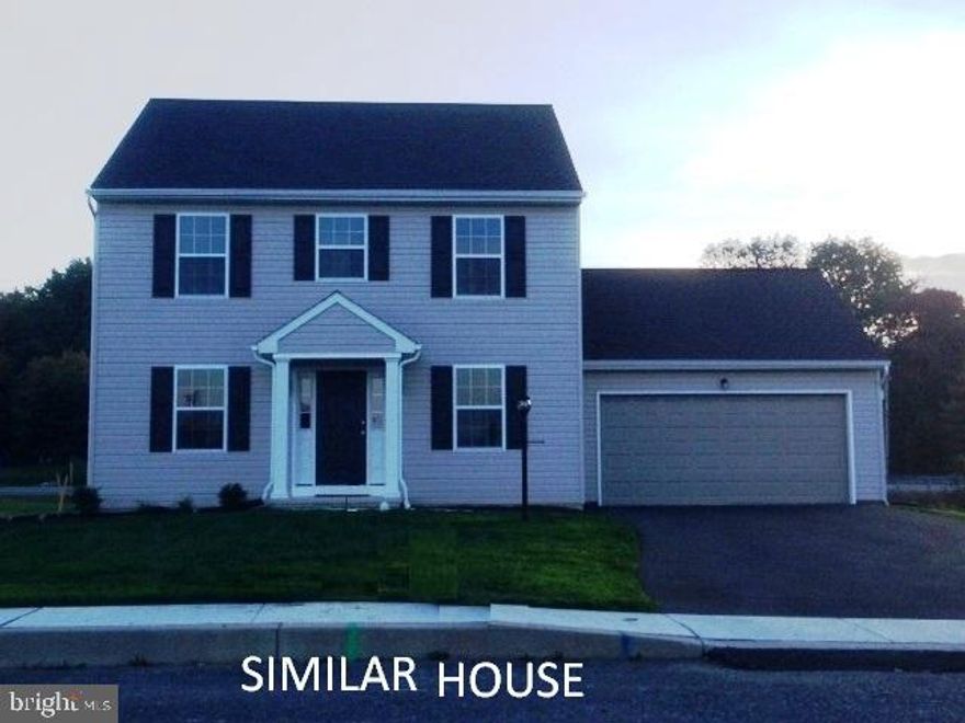 Custom Bambridge Model. Extended garage. Gas Fireplace