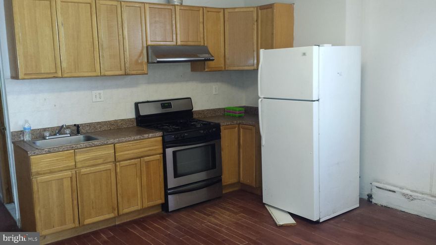 Legal Duplex located in a great location in 19147!  1st floor features 2 bedrooms, living area, full eat in kitchen, hardwood floors and full tile bath occupied $950/month.  2nd fl and 3rd fl are bi-level 3 bedrooms apartment, living area, full eat in kitchen, hardwood floors and full bath occupied $1100/month. This property is fully occupied by long term tenants on m/m leases.  Both current rents are below markets due to it's outdated conditions. With some sweats and improvements, this property can commands higher rents! Seller is selling property in "AS IS" condition..