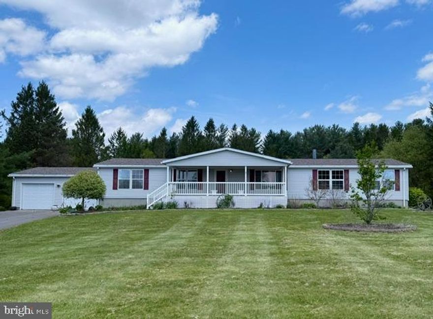 Park like, setting on 1.7 acres in Pleasant Valley, 4 Br, 2BA ranch home with full basement. Close to town yet, peaceful and secluded. Home features 4 Bedrooms, primary has 2 walk-in closets & large primary bath with walk-in shower.  Front living & dining areas, with main entrance from the covered front porch.   Open Kitchen, breakfast nook and den area with wood burning fireplace.  Opens to covered back porch overlooking enclosed large back yard.  3 Bedrooms and full bath.  Full basement, used for storage, however has plumbing for additional bath that could be installed, also has walk out to back yard.   2 Car garage leads to back entrance with washer dryer and pantry off kitchen.  Lots of room and all situated on a level lot, with paved driveway. Call for you private showing today!  This one will not last long.
