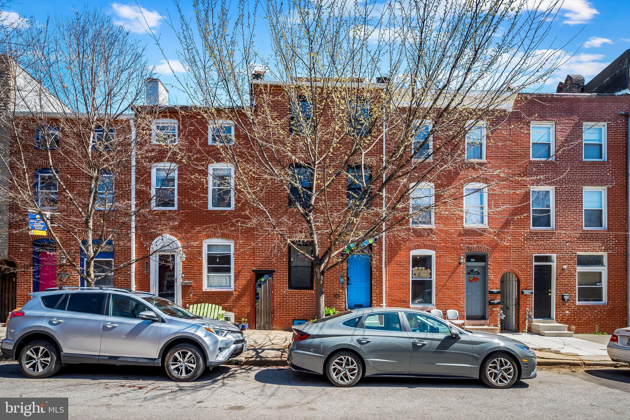 *** BEST & FINAL OFFERS REQUESTED BY MIDNIGHT ON WEDNESDAY, 4/3/24. OFFERS WILL BE REVIEWED THE FOLLOWING DAY*** Looking for more space? Need 4 actual upstairs bedrooms? This 3 story historic brick front home in a premier location has it with nearly 2,500 square feet of above grade living space, plus it has all the modern conveniences you need combined with the historic charm that you love! Some highlights include wood floors throughout, natural light flooding every living space, zoned heating and cooling, new roof in 2020, and high end finishes and upgrades throughout. The main level includes a spacious living room and dining room, a conveniently located half bathroom, and a bright, well designed chef's kitchen with built-in breakfast nook, stainless steel appliances, upgraded countertops, a rare pantry closet, and sliding doors that lead to a private rear patio. On the upper levels, you will find 4 spacious bedrooms, 3 full bathrooms, a laundry room, and a family room with wet bar. The primary suite includes a walk in closet and bathroom with jetted soaking tub, separate custom shower, and a bidet. There are ample closets in all 4 bedrooms and a large bonus room with a wet bar on the third floor leading to the cherry on top of this fantastic home- a huge two tiered rooftop deck (built in 2020) with sweeping downtown skyline, sunset, and water views! Expand your living space outdoors. With a built-in outdoor kitchen, it’s a great set up to entertain a crowd or to have quiet al fresco dinners on the shaded, breezy, deck. Life is simple here with a parking spot available to rent in the easily accessible parking lot that is just around the corner. This home sits on a charming tree-lined street with cafe lights to light the sidewalks at night, is close to Johns Hopkins, the waterfront promenade, great local shops, dining, and nightlife in Butchers Hill and Fells Point, and sits on a premiere block, close to Patterson Park, one of the best parks in Baltimore! Come check out this beautiful, unique historic home & fall in love! *Property may qualify for the Johns Hopkins Live Near Your Work $5,000 Grant Program.*