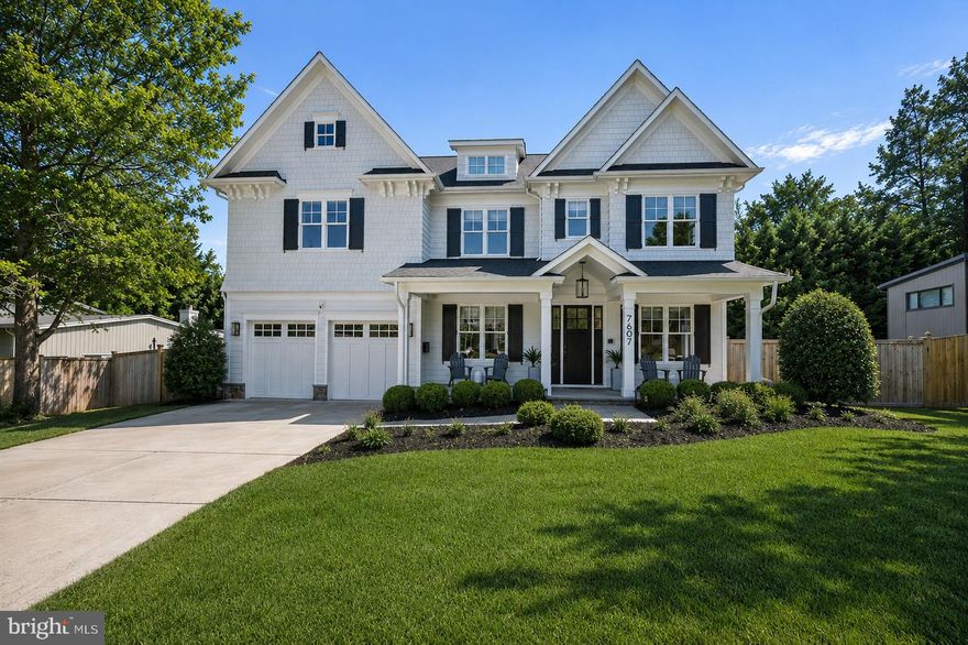 7607 Hemlock Street | Bethesda, MD 20817

Some homes are built to impress. This one was built to live in — and the difference shows in every detail.

Set on a quiet street in Oakwood Knolls, one of Bethesda's most coveted neighborhoods, 7607 Hemlock is a custom-crafted residence where thoughtful design meets the rhythms of real family life. Highly ranked Walt Whitman High School and Pyle Middle School are an easy walk away; Burning Tree Elementary is a two-minute drive. For families who've made the school district a priority, the location alone is the story.

The home's flagstone porch and striking architecture announce what's inside: over 6,000 square feet of light-filled, intelligently designed living space. The main level opens with a gracious center hall foyer leading to soaring ceilings, rich oak floors, and a seamless flow between formal and informal spaces — crown and wainscoting moldings, coffered and tray ceilings, and high-end hardware throughout. The formal living and dining rooms give way to a fully appointed entertainer's bar with beverage center, sized for the kind of hosting that doesn't require apology.

At the heart of the home, the gourmet kitchen was designed for people who actually cook. A massive center island anchors the space, flanked by quartz countertops, a large walk-in pantry, and professional-grade Thermador appliances — a six-burner gas range with built-in griddle, double wall ovens, and an oversized side-by-side refrigerator. Discreet under-cabinet electrical outlets keep the counters clean. The adjacent family room, with its wall of windows, custom cabinetry, and gas fireplace framed for a large-screen TV, is where the day ends.

When the weather cooperates — and even when it doesn't — a full-width NanaWall opens the kitchen directly onto a large screened-in porch, collapsing the boundary between inside and out. The backyard has been fully re-graded and transformed: a new stone patio, lush landscaping, and a perimeter of Chindo viburnums sourced from a North Carolina family nursery. Already deeply rooted, these pet-safe, low-maintenance evergreens will reach approximately 16 feet, delivering a private canopy without encroaching on the yard itself.

A dedicated main-level study, powder room, and a mudroom with built-in cubbies round out a floor plan that anticipates how families actually move through a day.

Upstairs, the primary suite is a proper retreat: private foyer entry, tray ceilings, two large walk-in closets with custom built-ins, and a spa bath with an oversized shower and dual vanities with custom mirrors and sconces. Three additional bedrooms — each generously sized — share two full baths, while a separate upper-level living space serves naturally as a study zone, playroom, or secondary family room. A spacious laundry room with extensive cabinetry and large-capacity machines is where it should be: on the bedroom level.

The fully finished lower level adds meaningful square footage without feeling like an afterthought. A recreation room with wet bar, a private theater room, a rubber-floored exercise room, and a bedroom suite with full bath and walk-in closet together create a floor that functions as a destination, not just overflow space. The two-car garage has been fitted with overhead storage racks — a small detail that matters when you're actually using it. Not to mention, a whole house generator!

Oakwood Knolls puts downtown Bethesda, Chevy Chase, and Tysons Corner within easy reach, with straightforward access to DC and three major airports. For a family ready to stop compromising between location, schools, and the home itself — it's hard to imagine doing better than this.