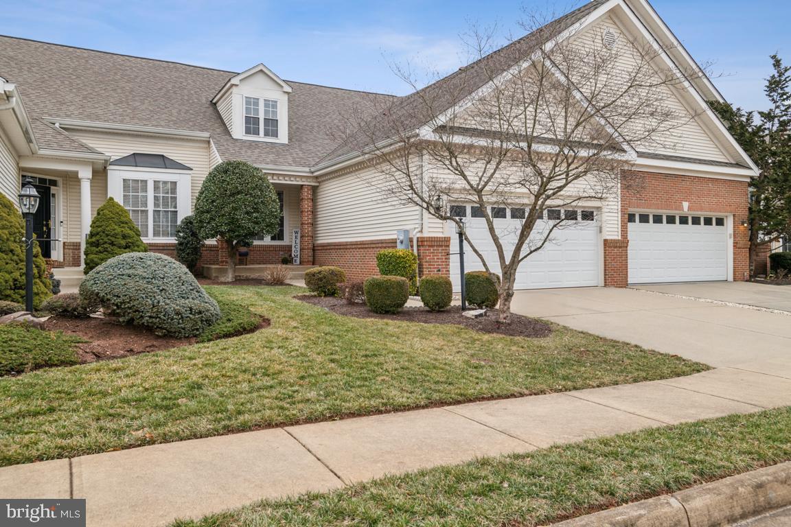 This is a beautiful Aster Model home with a full unfinished basement with walkout access to the second fairway.  Foyer entry leads to the living room and dining room.  The expansive kitchen  offers eating area, plenty of counter space and pass-through to the family-room with a gas-fireplace.  The ample two car garage leads to the laundry/storage area and into the kitchen.  The main floor bedroom  feature a full shower bath and expansive storage closet.  A deck outside of living room overlooking the 2nd fairway of the  golf course. Up stairs offers a large living area with view to the golf course, two bedrooms and a third bath.  The basement is completly unfurnished and waiting for you to personalize.   The Heritage Hunt 55+ community offers  two expansitive club houses with  Amenities including an Arnold Palmer golf course, Bike/Walking Trails, exercise room, community rooms, indoor and outdoor pool, plus restaurant.  A bundle of Happy Living!