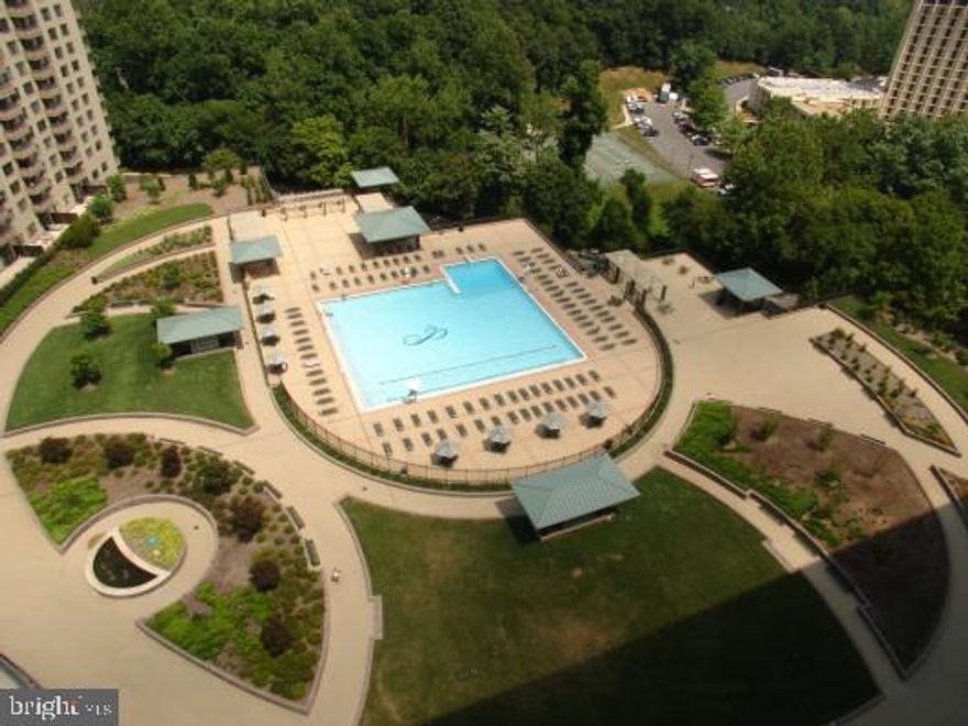 2 Bedroom 1 Bath on upper floor in luxury High-Rise. Rent includes all utilities + basic cable + 1 garage space.