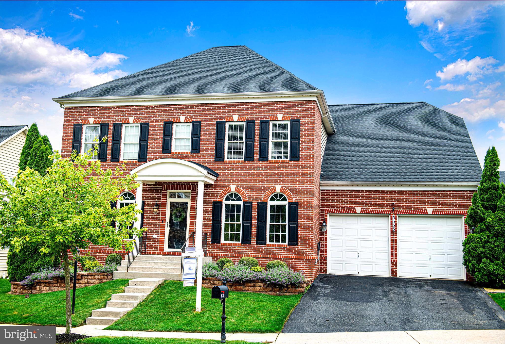 Stately 5-bedroom, 4 1/2 bath brick-front Colonial loaded with recent updates and modern upgrades! Enjoy peace of mind with a new roof, new HVAC, and new water heater. The heart of the home shines with a renovated kitchen and updated bathrooms—all completed within the past 4 years. Step through the new French doors to a freshly installed patio, perfect for outdoor entertaining. The finished lower level offers two spacious bonus rooms and a sleek custom bar, ideal for game nights or guests. Eco-conscious buyers will appreciate the Tesla charger ready to power your ride. A perfect blend of comfort, style, and smart features—this is one you won’t want to miss!