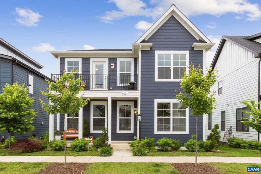 Beautifully designed home with detached garage, Carriage House in Old Trail Village. Light filled and open main level featuring a welcoming foyer, elegant dining area, cozy great room with gas fireplace, & a chef-inspired kitchen complete with gas cooking, pantry, double-sided kitchen island tons of storage.  The detached carriage house with an ADU adds flexibility and value, offering a 1-bedroom apartment above the two-car garage?ideal for a home office, in-law suite, or rental opportunity. The possibilities are endless.  Outdoor spaces include an updated front porch with a covered roof, back deck off the kitchen and custom patio that is beautifully landscaped, with a walkway to the Carriage House and oversized 2 car garage.  Upstairs, there is a spacious primary suite boasting its own private deck, a generous walk-in closet, and ensuite bathroom. Two additional bedrooms, and a second full bath room with double vanity, and a side-by-side laundry room.  Enjoy life in a vibrant community just steps from walking trails, charming shops, local dining, a community pool, and a championship golf course. With fiber optic internet, Pearl Gold Certification.,Granite Counter,Painted Cabinets,Fireplace in Living Room