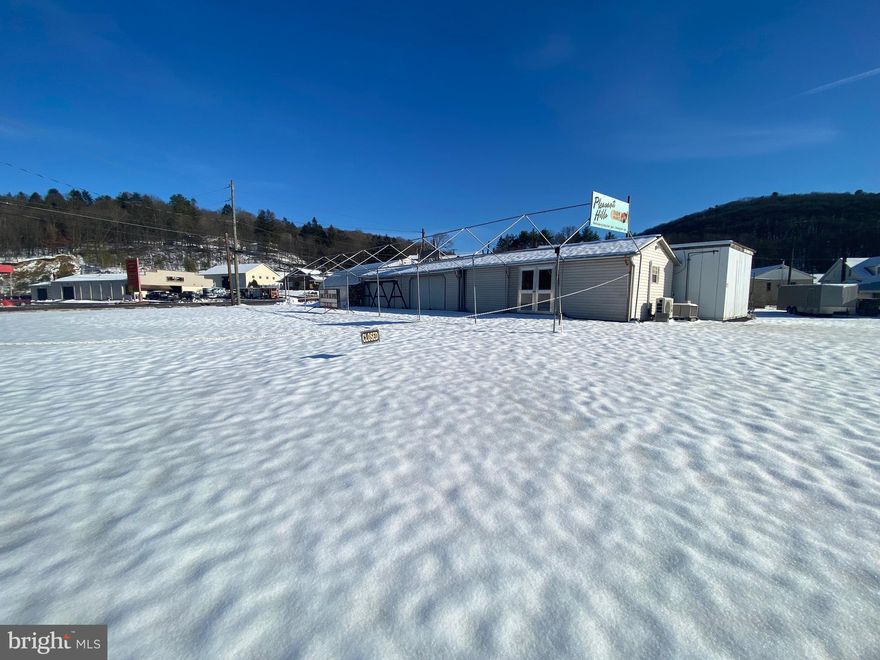 Now is your chance to grab this PRIME corner lot!! High visibility at the intersection of Rt. 309 and 443 in South Tamaqua! Multiple lots included in this sale! Lots are listed below! Great business location with endless possibilities! Also included in the sale is a 3 bed, 1 bathroom home (currently rented), a garage, and the front road stand building. Multiple access points for the property. Lots included: 37-06-0018.000, 37-06-0019.000, 37-06-0034.000, 37-06-0020.000, 37-06-0021.000, 37-06-0008.001. Don't miss out because this top notch property will not last long!