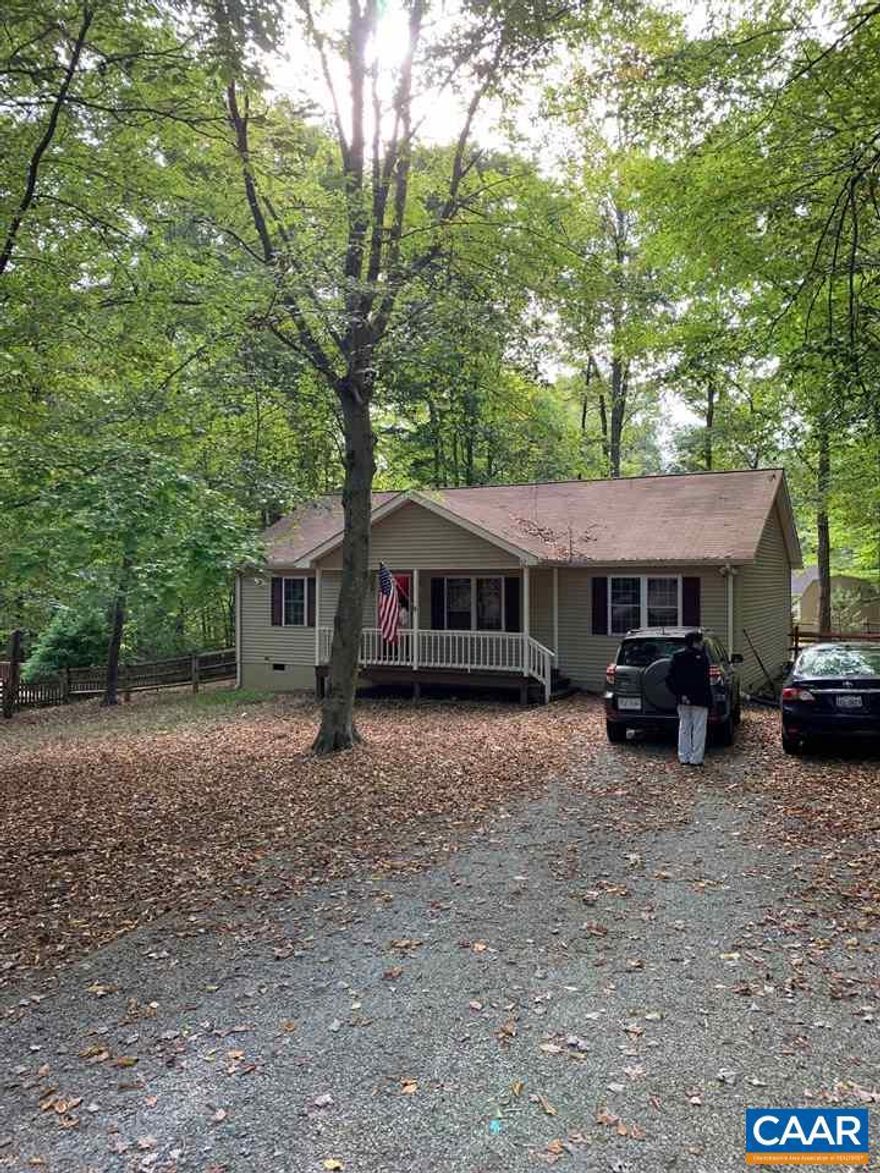 Great home in a Lake community. In excellent shape to move right in.  This charming 3-bedroom, 2-bath home offers 1260 square feet of main-level living on a 0.35-acre lot inside the gated Lake Monticello community. The light-filled layout features a comfortable living room, an eat-inkitchen, and three bedrooms, all on one level for easy convenience. Outside, enjoy a private, tree-shaded yard with plenty of space for gardening, play, or relaxing. With access to Lake Monticello?s amenities?including beaches, boating, golf, tennis, and walkingtrails?this property is perfect for a first-time buyer, downsizer, or investor. This wont last long.