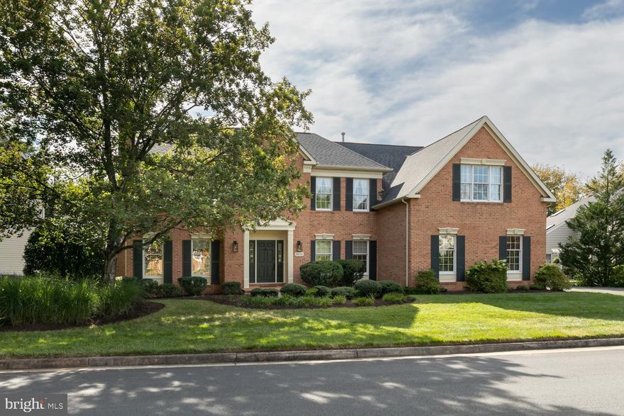 Welcome to this exceptional Philmont model in the highly sought-after Century Oak community, offering approximately 4,600 square feet of beautifully finished living space designed for refined everyday living and effortless entertaining.
A grand two-story foyer with gleaming hardwood floors sets the tone upon entry, flanked by an elegant formal dining room and a gracious living room anchored by a gas fireplace. French doors open to a private executive office featuring custom built-ins—ideal for today’s work-from-home lifestyle.
The heart of the home is the stunning two-story family room where a striking wood-burning fireplace creates an impressive yet inviting gathering space. Seamlessly connected, the breakfast room and gourmet kitchen are perfectly suited for both intimate meals and large-scale entertaining, featuring updated appliances, generous prep space, and abundant cabinetry. Step outside to a beautiful flagstone patio overlooking the private, fenced rear yard, an ideal setting for outdoor dining and summer evenings under the stars.
Upstairs, a convenient rear staircase leads to five spacious bedrooms. The luxurious primary suite serves as a true retreat, complete with customized walk-in closet and a renovated spa-inspired bath designed for relaxation. Four additional bedrooms are thoughtfully arranged with two well-appointed Jack-and-Jill baths, including one bedroom with its own private sitting room—perfect for guests, an au pair, or a secondary suite.
The walk-up lower level expands the home’s versatility with a sprawling recreation room, dedicated game area, sauna, private den or second office, full bath, and substantial storage space—ideal for multi-generational living, fitness, hobbies, or media enjoyment.
Meticulously maintained and thoughtfully updated, recent 2026 improvements include refinished hardwood floors, new carpet, and paint throughout, offering a fresh, turnkey feel. A three-car side-load garage with electric vehicle charger adds both convenience and modern functionality.
Century Oak residents enjoy an exceptional community lifestyle with access to a swimming pool, clubhouse, tennis and pickleball courts, and scenic walking trails. Perfectly positioned near INOVA Fair Oaks Hospital, Fair Oaks Mall, Reston Town Center, the Dulles Toll Road, and Dulles International Airport, this home offers both tranquility and unmatched accessibility.
A rare opportunity to own a timeless and beautifully updated home in one of Fairfax’s premier neighborhoods.