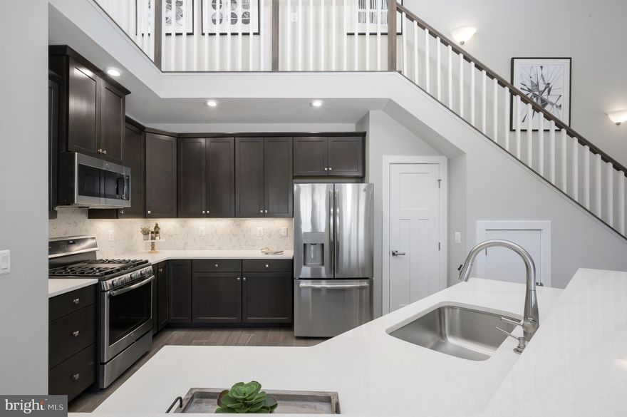 Summer 2021 move -in Chambord with Loft! Embrace the convenience of a condo with all the comforts of home! Enjoy your own private 1 car garage & driveway, 1-level living with open design and loft!  Gourmet kitchen w/ 2-tier island, private covered porch, panoramic views in primary suite, and so much more! Built with upgraded 5  engineered hardwood, intricate tile, granite in kitchen and both baths, 42 inch kitchen cabinets! Community features endless amenities   truly resort-style living! Photos are representative