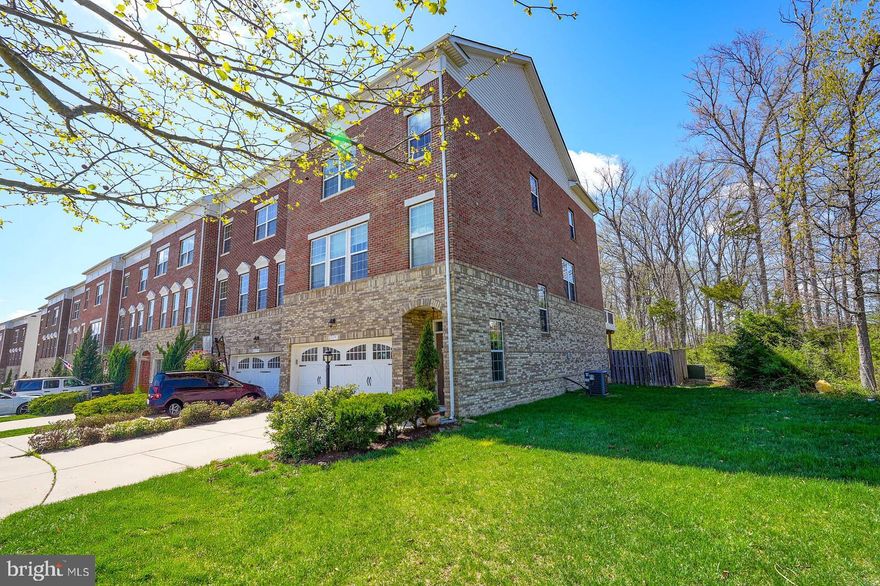 Nestled on a premium cul-de-sac lot, this stunning end-unit, 3-level townhome offers unparalleled privacy and serenity, backing directly to the Tree Conservatory and the 267-acre Hanson Regional Park. With bump-outs on all three levels, the home boasts expansive living space and unique architectural charm. Enjoy the outdoors with a spacious deck, perfect for relaxing or entertaining while overlooking the natural wooded backdrop.

The interior is equally impressive, featuring 3 generously-sized bedrooms, 2 full bathrooms, and 2 convenient half baths. The spacious main level showcases a beautiful gourmet kitchen with granite countertops, stainless steel appliances, and hardwood flooring throughout. The upper level includes the owner's suite, complete with a HUGE walk-in closet, a bathroom with double sinks, a large shower, and a lovely soaking tub. Two additional nice-sized bedrooms, a second full bathroom, and a laundry room complete the third floor.

Additional features include ample parking space, ensuring ease of access for you and your guests. This townhome perfectly blends seclusion and convenience, offering both tranquility and proximity to everything you need.

The HOA fee includes Cable TV, Common Area Maintenance, High-Speed Internet, Snow Removal, Trash, and access to fantastic amenities, including five community pools, over 18 miles of scenic trails, three rentable clubhouses, multiple parks, lighted tennis courts, sand volleyball courts, basketball courts, a dog park, jogging/walking paths, playgrounds, tot lots, and more.

Brambleton Town Center offers a state-of-the-art library, a farmers market, grocery stores, a movie theater, fitness centers, gas stations, restaurants, pharmacies, boutiques, meeting spaces, and more. It’s just minutes away from HAL & Berni Handon Regional Park (a 257-acre park), with easy access to major commuter routes like NorthStar Blvd, Belmont Ridge Rd, Loudoun County Parkway, the 267 Greenway/Toll, and Route 50. Nearby, you'll find recreational areas, an extensive trail network, public transit options, the Ashburn Metro (Silver Line), NOVA, Dulles International Airport, Loudoun Station, Broadlands Village, One Loudoun, Dulles Landing, and much more.

EXCELLENT SCHOOLS include Madison’s Elementary, Watson Mountain & Brambleton Middle, and Independence High School.