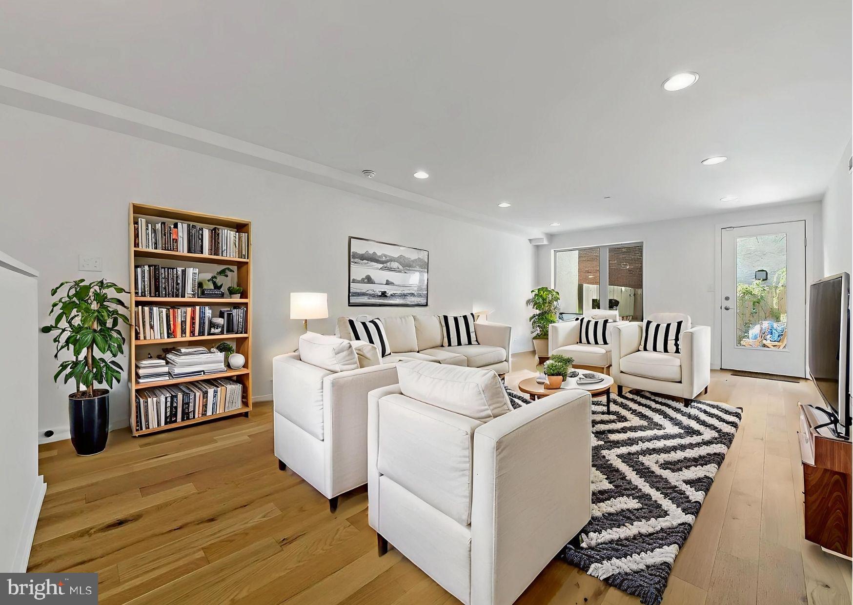 🚨 $10,000 Seller Assist Alert! Pair that with one of my lender's exclusive grant programs and you're looking at a home that’s practically FREE to move into. This is your chance to own a piece of the city and start building equity with way less out-of-pocket. Welcome to Girard Condos, a standout Callahan Ward development right on the lively Girard Avenue corridor. You’ll love the modern design, clean finishes, and unbeatable location just minutes from all the energy of Fairmount’s dining, shopping, and cultural scene. Built in 2017, this bright and quiet unit offers your own private entrance leading into a welcoming foyer with a large coat closet. The kitchen is a showstopper with a huge granite island perfect for hosting or whipping up your favorite meals. The open floor plan flows effortlessly into the spacious living and dining area, filled with natural light from oversized windows. Step outside to your private patio, a perfect outdoor space for entertaining or relaxing. Head downstairs to a versatile bonus room ideal for your home office, gym, or cozy movie den. This level also features a full bathroom and a secondary bedroom, plus a private primary suite tucked away in the back with its own ensuite bath. Highlights include wide plank oak flooring, stainless steel appliances, sleek porcelain tile, and polished chrome finishes throughout. Easy street parking, convenient access to Center City and major highways, and 2 years remaining on the tax abatement make this one a total win. Don’t miss your chance to snag this move-in ready gem. With thousands in assistance, this is one of the best deals in the city. Let’s get you through the door.