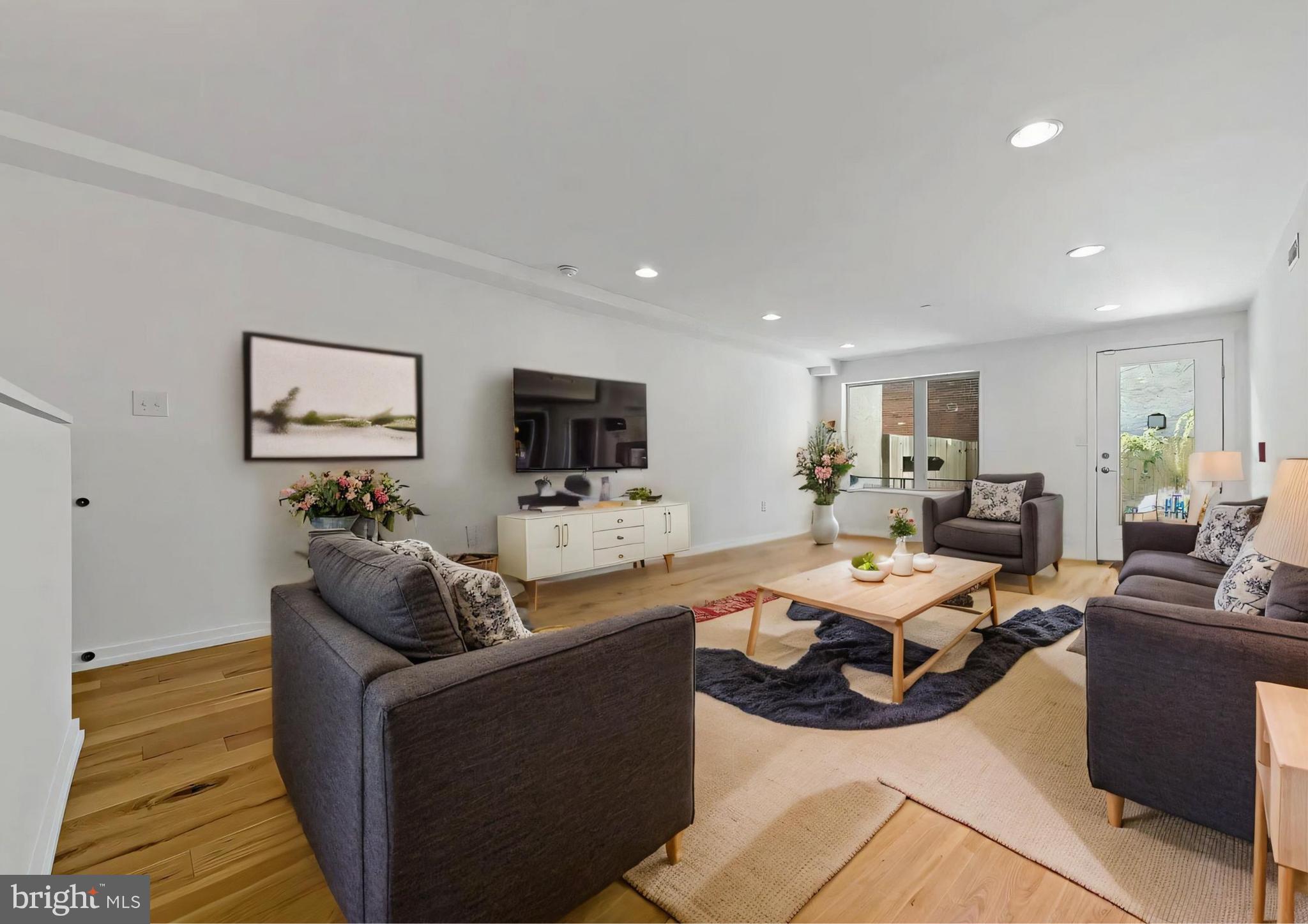 🚨 $10,000 Seller Assist Alert! Pair that with one of my lender's exclusive grant programs and you're looking at a home that’s practically FREE to move into. This is your chance to own a piece of the city and start building equity with way less out-of-pocket. Welcome to Girard Condos, a standout Callahan Ward development right on the lively Girard Avenue corridor. You’ll love the modern design, clean finishes, and unbeatable location just minutes from all the energy of Fairmount’s dining, shopping, and cultural scene. Built in 2017, this bright and quiet unit offers your own private entrance leading into a welcoming foyer with a large coat closet. The kitchen is a showstopper with a huge granite island perfect for hosting or whipping up your favorite meals. The open floor plan flows effortlessly into the spacious living and dining area, filled with natural light from oversized windows. Step outside to your private patio, a perfect outdoor space for entertaining or relaxing. Head downstairs to a versatile bonus room ideal for your home office, gym, or cozy movie den. This level also features a full bathroom and a secondary bedroom, plus a private primary suite tucked away in the back with its own ensuite bath. Highlights include wide plank oak flooring, stainless steel appliances, sleek porcelain tile, and polished chrome finishes throughout. Easy street parking, convenient access to Center City and major highways, and 2 years remaining on the tax abatement make this one a total win. Don’t miss your chance to snag this move-in ready gem. With thousands in assistance, this is one of the best deals in the city. Let’s get you through the door.
