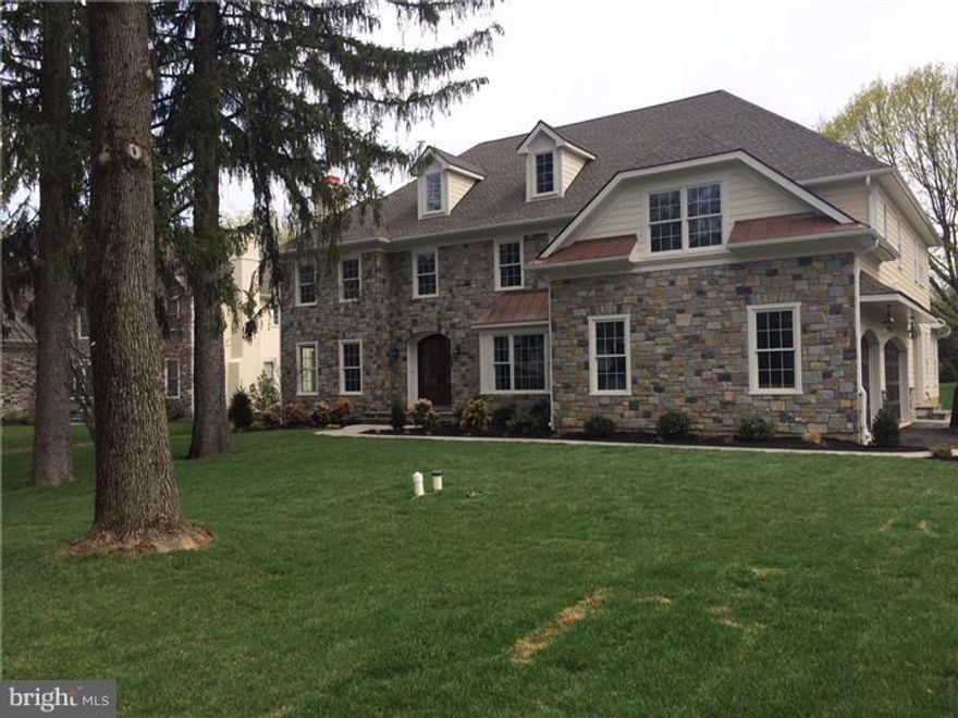 Staged New Construction ready for Immediate Delivery! Now with large finished basement with full bathroom. This fantastic custom home proudly boasts of 5 Bedrooms, 5 full + 2 half baths and a 3 car garage with arched wood carriage style overhead garage doors in the premier Lower Merion School District. The custom designed home blends a desirable open Kitchen/Breakfast/Family living area with complete southern exposure and a traditional Main Line colonial floor plan. A custom natural stone blend adorns the front facade while durable Hardiplank wood grained siding complements the established neighborhood of this "walk-to-town" Gladwyne cul-de-sac location. Extensive new landscaping and bluestone patios add to the mature trees found on this spacious level lot. The sophisticated Kitchen includes a tasteful design featuring Sub Zero, Wolf and Bosch appliances, a Butler's Pantry with a wet bar and beverage refrigeration, Walk-in Pantry, farm sink, tumbled marble backsplash and low voltage cabinet lighting. The elegant custom millwork includes arched openings, custom wainscoting and mantles, a Family Entry bench with cubbies and grand crown moldings, casing and baseboard. The exquisite Master suite provides for both elegance and comfort. Here you will find a grand bedroom with coffered ceiling overlooking the rear yard. Dual Master Vanities flanked by drawers, a Claw foot soaking tub with classic telephone style brass faucet, spacious walk-in shower with a Victorian style exposed thermostatic valve control, oversized shower head and handle spray. His and Her closets with built in shelving and cabinetry and a private linen closet. The elegance of the home is complemented by quality of its construction. A three zone HVAC system is used with two 90% Heaters and 13 SEER condensing units. PEX manifold system supply lines ensure convenience and pressure. LED recessed lighting throughout. Minutes to highways, Center City and major employment centers.