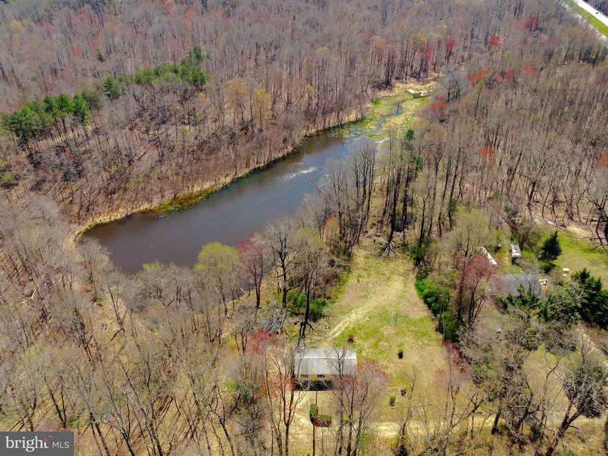 Vacation at home! Imagine not having to travel far to get to work. And when you get home, relaxing in the backyard looking at the water. This 3-bedroom 2 bath home features good sized living spaces, separate laundry room, Large Living room, huge kitchen and dining area. Roof is only 5 years old.  Fairly level yard you can use to have many cookouts and play games. You can fish in your own yard.  Large shed to store your belongings. This home is close to where you want to be :  shops, paint ball, antiques, museum, restaurants, outdoor recreation, beach, parks, fitness and more.  Only 5 minutes to Virginia. Make an appt to see this 1152 sq ft home today!