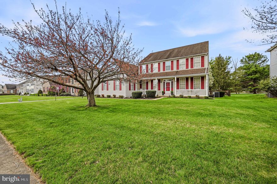 Welcome to 62 Hillary Circle—an impeccably maintained Colonial that blends timeless style with modern comfort. From the inviting front porch to the impressive three-car side-entry garage, this home makes a striking first impression.  Step into the foyer and be greeted by gleaming hardwood floors that extend throughout the main level. A set of French doors opens to a private home office on one side, while a versatile formal living room—currently used as a music space—sits on the other.  At the heart of the home is a beautifully appointed eat-in kitchen, featuring stainless steel appliances, a gas range, granite countertops, a stylish backsplash, and a spacious pantry. There’s ample room for everyday dining, and sliding glass doors lead directly to the tiered deck and fenced backyard—perfect for entertaining or relaxing outdoors. The adjacent family room impresses with vaulted ceilings and a cozy wood burning  fireplace, creating a warm and inviting gathering space.  The main level also includes a convenient half bath, a full laundry room with a utility sink, and direct access to the garage.  Upstairs, you’ll find four generously sized bedrooms and two full baths. The expansive primary suite offers a peaceful retreat with a sitting area, walk-in closet, and a luxurious en suite bath complete with a jetted tub, separate shower, and double vanities.  The partially finished basement provides additional flexible space—ideal for a game room, home gym, or hobbies.  Conveniently located near major roadways, shopping, and dining, this home offers both comfort and accessibility. Schedule your private showing today and experience everything this exceptional property has to offer.