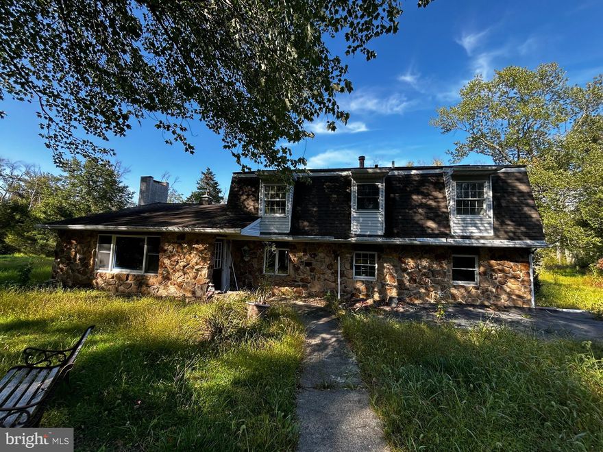 1.66-Acre s+ 4 Additional Lots!
 Ultimate Private Sanctuary –2300 SQ FT Canvas on 1.66 Acres with 4 Extra Lots
Escape to a world of your own. This hidden gem is perfectly set back and secluded, offering a "full-renovation" opportunity for those who value  privacy. The property features a spacious 2300 sq. ft. floor plan and a massive 3-bay standalone garage, ideal for collectors or craftsmen. With four additional lots included, you have the rare chance to preserve the surrounding nature or expand your footprint. Bring your contractor and your vision to this full renovation.