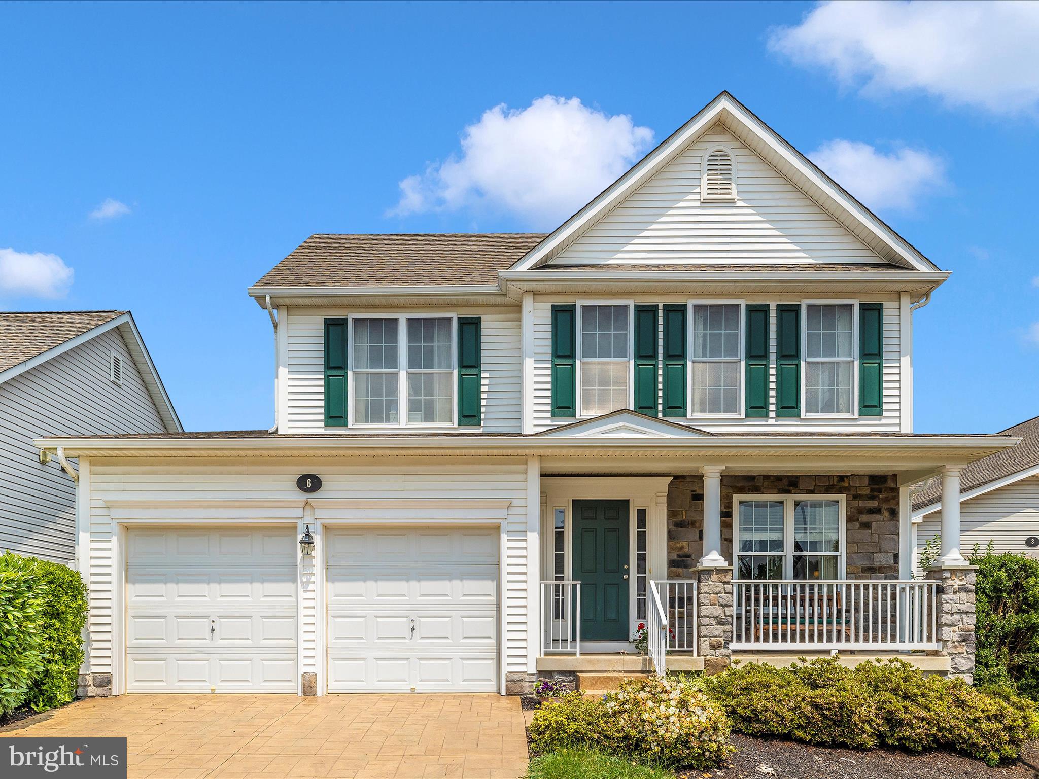 Introducing a lovely custom-built Admar home in Middletown’s premier 55+ community. Built in 2010, with 1895 sq. ft. of well-appointed living space, this home offers open concept living. Living and dining room areas feature hardwood floors and large windows. The well equipped kitchen has ample table space to enjoy morning coffee while looking out onto the back patio. The family room with its vaulted ceiling connects the home. It offers access to the first floor primary bedroom with its large walk-in closet and ensuite bath. Outside, the extensive hardscape enhances the outdoor living experience, with a screened porch and patio for relaxation or gatherings. Upstairs find one bedroom and a full bath. In lieu of a 3rd bedroom upstairs, the owner chose to create a cozy, carpeted, open sitting room space complete with a custom wrought iron railing detail. Descend to the lower level via a carpeted stairway and find many features that invite expansion: an egress window, plumbing for a bathroom and a framed room ready for finishing. The 2-car, attached garage provides easy access & boasts finished walls; the stamped concrete driveway provides additional parking options. The roof was just replaced June 2025! This home is not just a place to live; it’s a lifestyle choice that emphasizes comfort, community, and convenience. Embrace the opportunity to make this lovely property your new home!